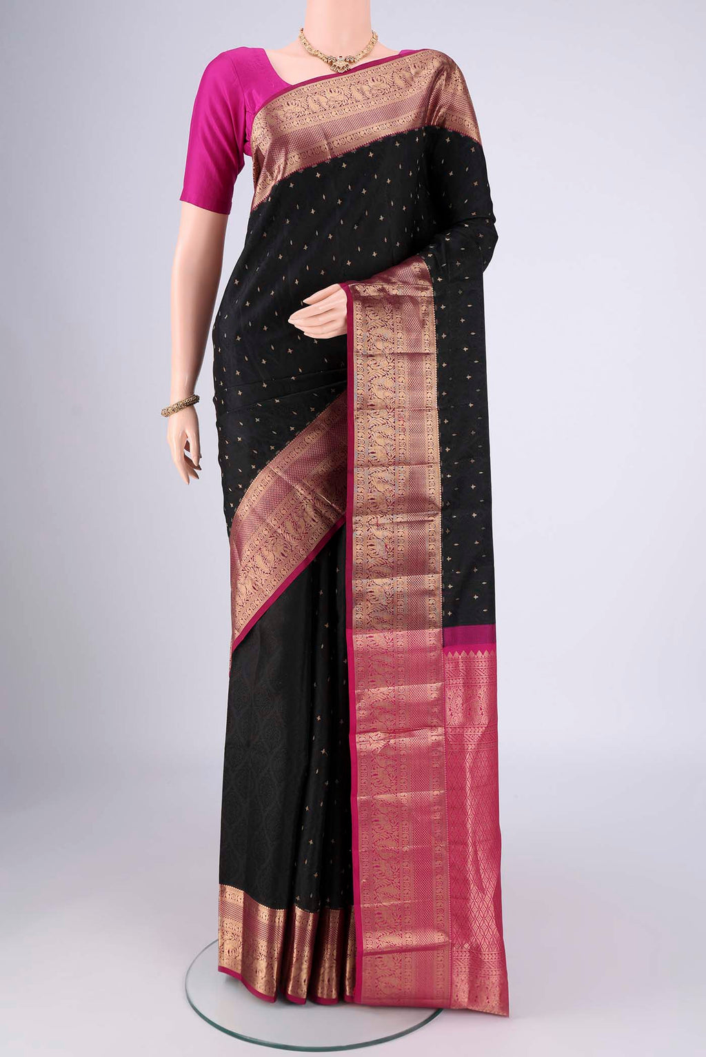 Black Dual Tone Soft Silk Saree with Jacquard With Zari Butta on the body and Zari Border.  displayed on a mannequin