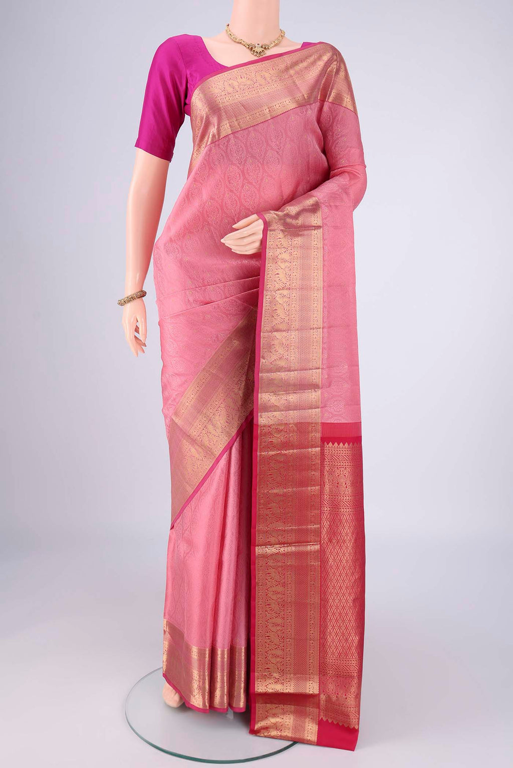 Rose pink Dual Tone Soft Silk Saree with Jacquard With Zari Butta on the body and Zari Border.  displayed on a mannequin