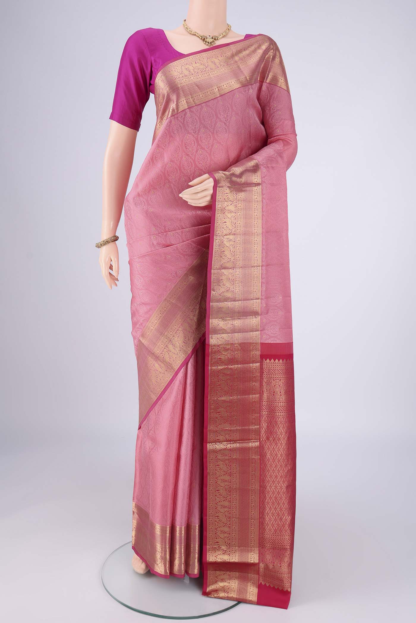 Rose pink Dual Tone Soft Silk Saree with Jacquard With Zari Butta on the body and Zari Border.  displayed on a mannequin