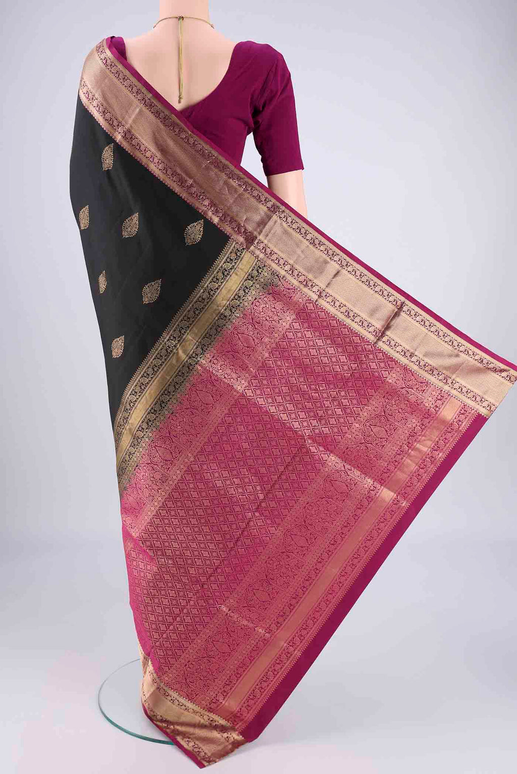 Flat view of Black Dual Tone Soft Silk Saree with Zari Brocade on the body and Zari Border. 
