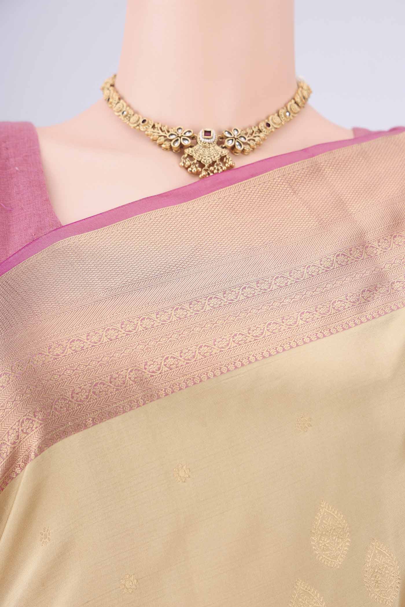 Border image of Beige Dual Tone Soft Silk Saree with Zari Brocade on the body and Zari Border. 