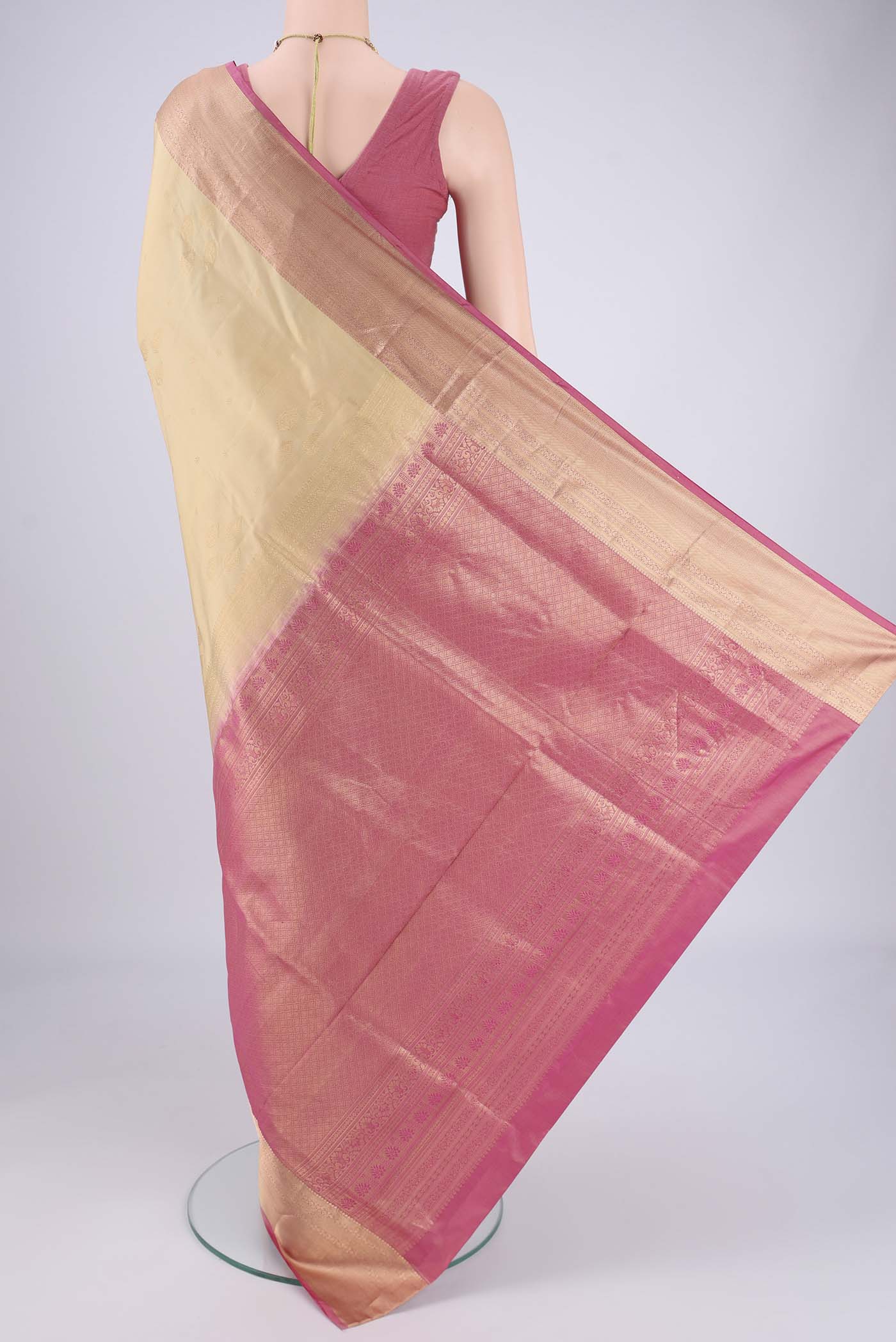 Flat view of Beige Dual Tone Soft Silk Saree with Zari Brocade on the body and Zari Border. 