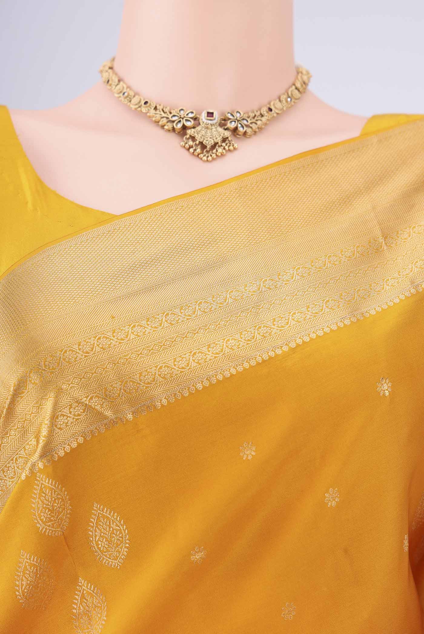 Border image of Mustard Dual Tone Soft Silk Saree with Zari Brocade on the body and Zari Border. 