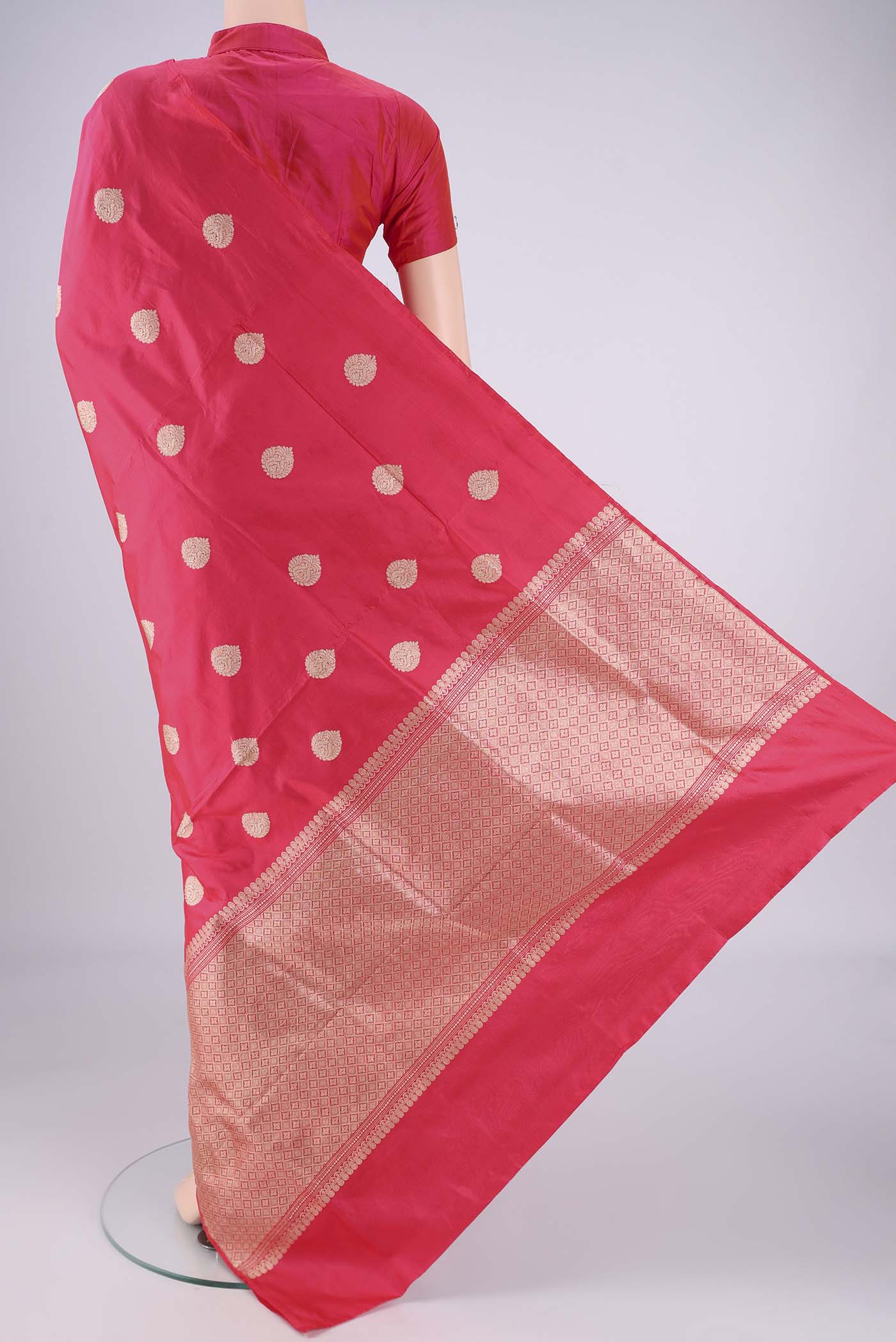 Flat view of Dark Pink Dual Tone Banarasi Silk Saree with Zari Butta on the body and Without Border. 