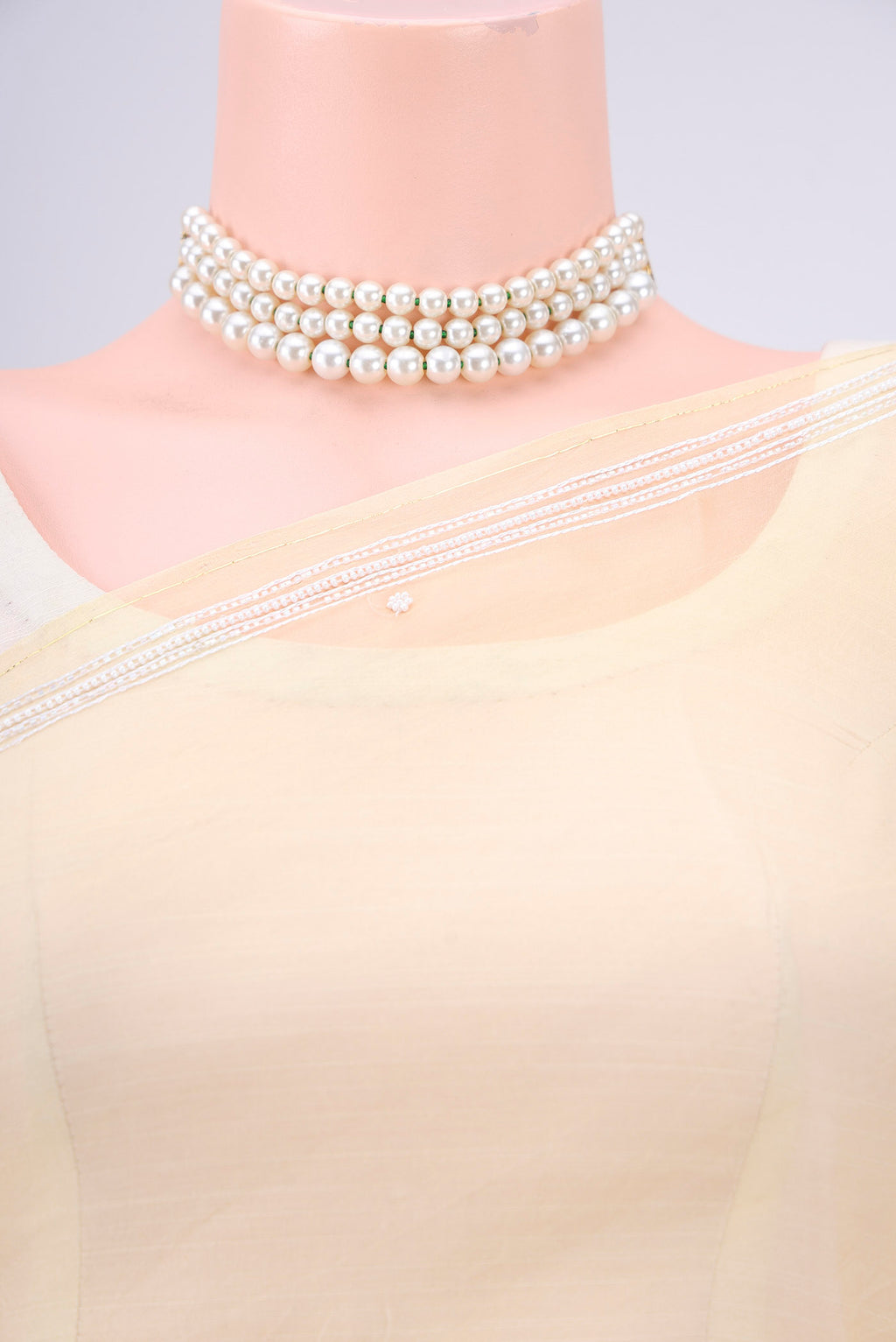 Border image of Lemon Yellow Organza Silk Saree with Embroidery on the body and Zari Border. 