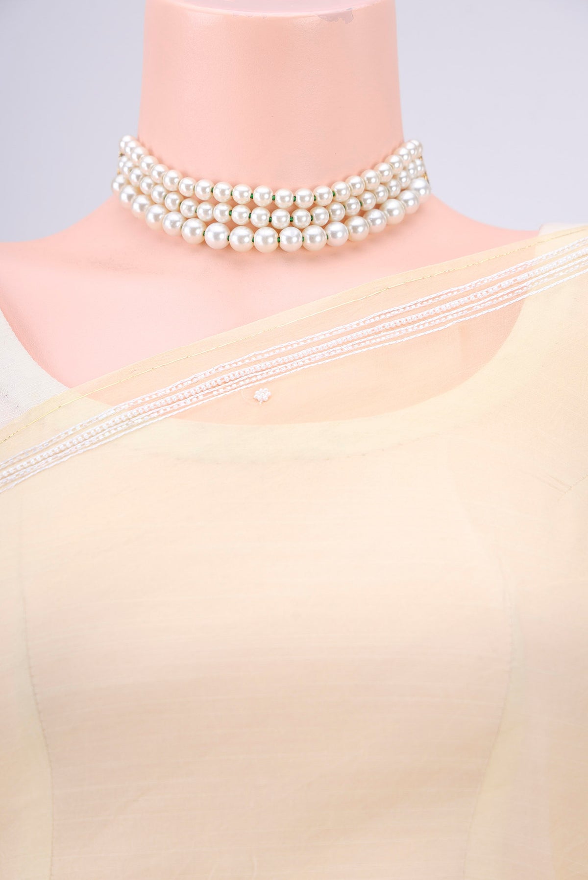 Border image of Lemon Yellow Organza Silk Saree with Embroidery on the body and Zari Border. 