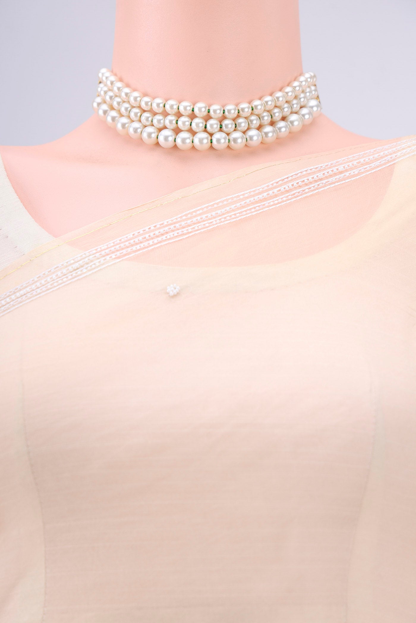 Border image of Sandal Organza Silk Saree with Embroidery on the body and Thin Zari Line. 