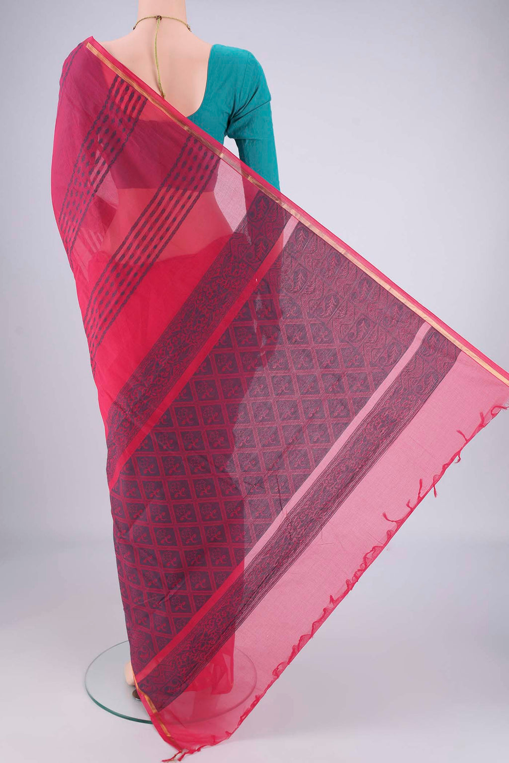 Flat view of Rani Pink Kanchi Cotton Saree with Stripes on the body and Thin Zari Line. 
