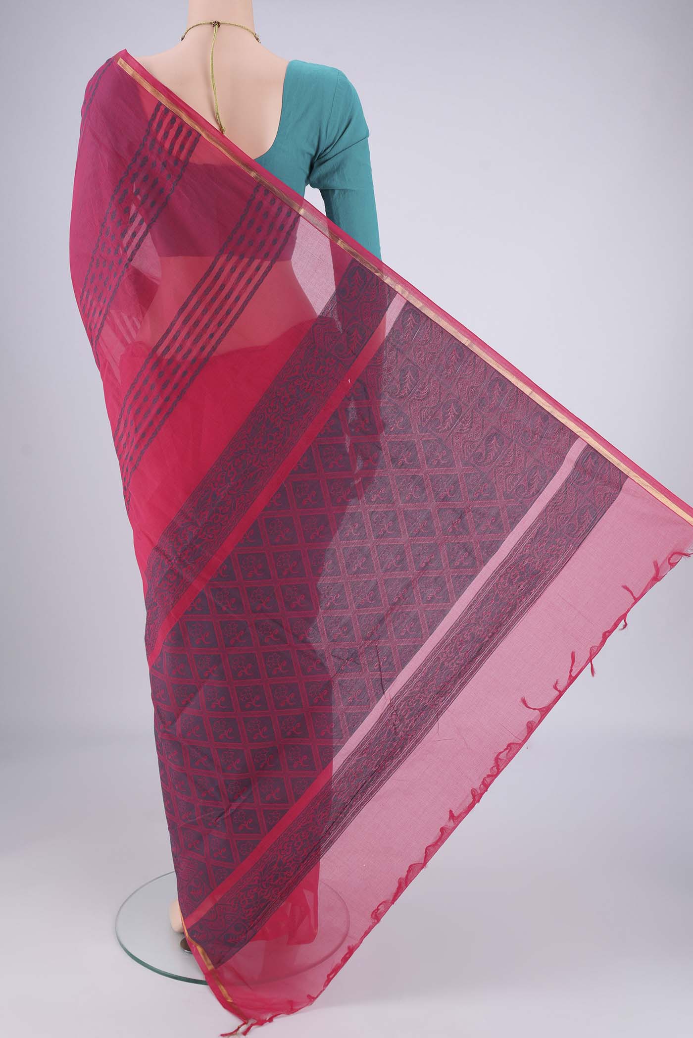Flat view of Rani Pink Kanchi Cotton Saree with Stripes on the body and Thin Zari Line. 