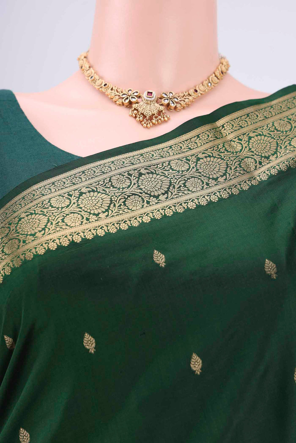 Border image of Bottle Green Soft Silk Saree with Zari Butta on the body and Zari Border. 