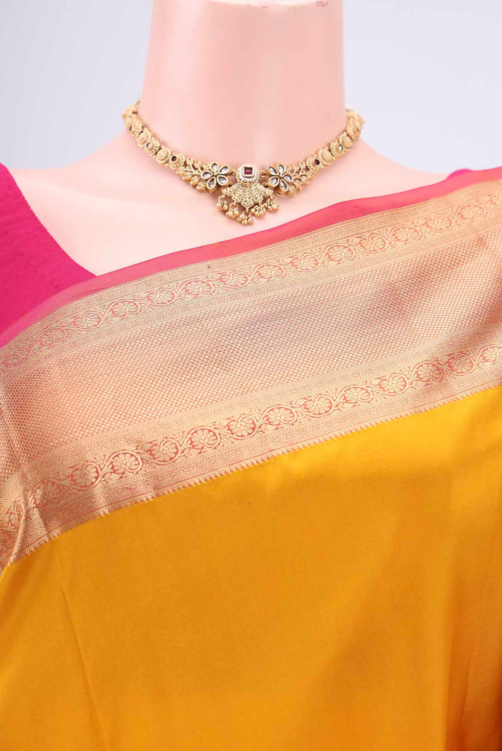 Border image of Yellow Soft Silk Saree with Zari Butta on the body and Zari Border. 