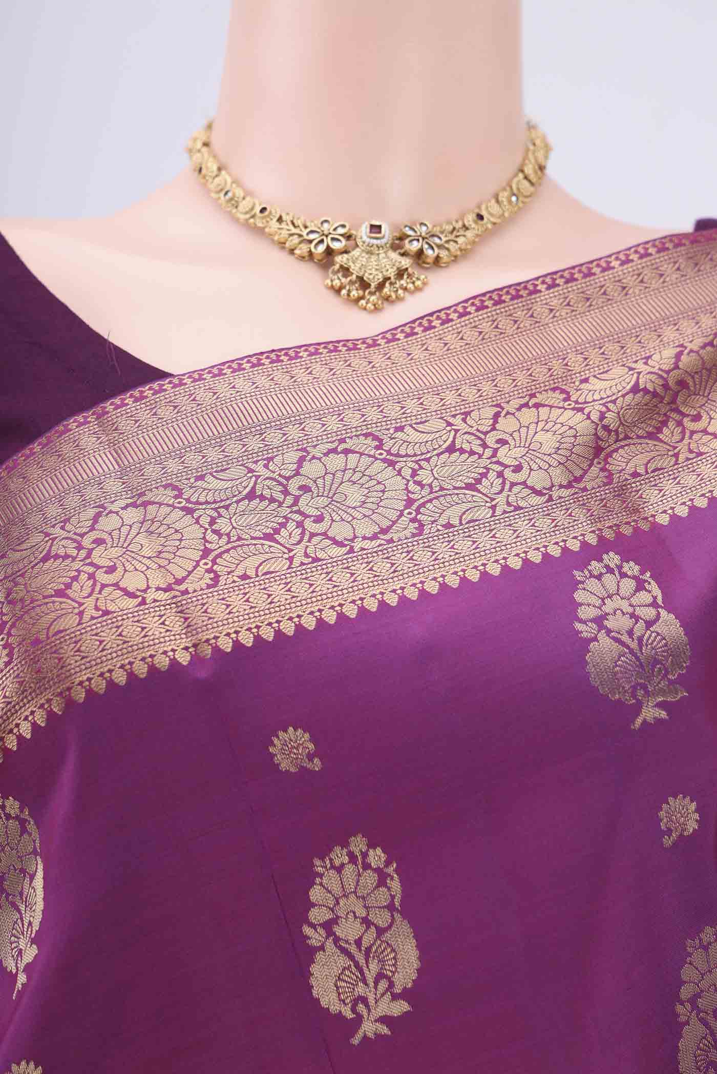 Border image of Purple Soft Silk Saree with Zari Butta on the body and Zari Border. 