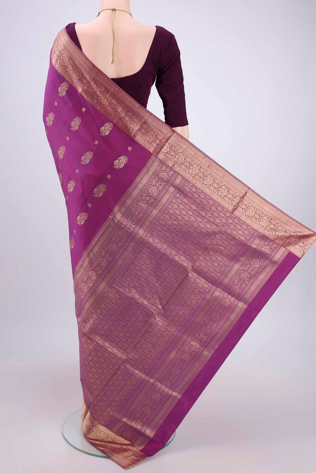 Flat view of Purple Soft Silk Saree with Zari Butta on the body and Zari Border. 