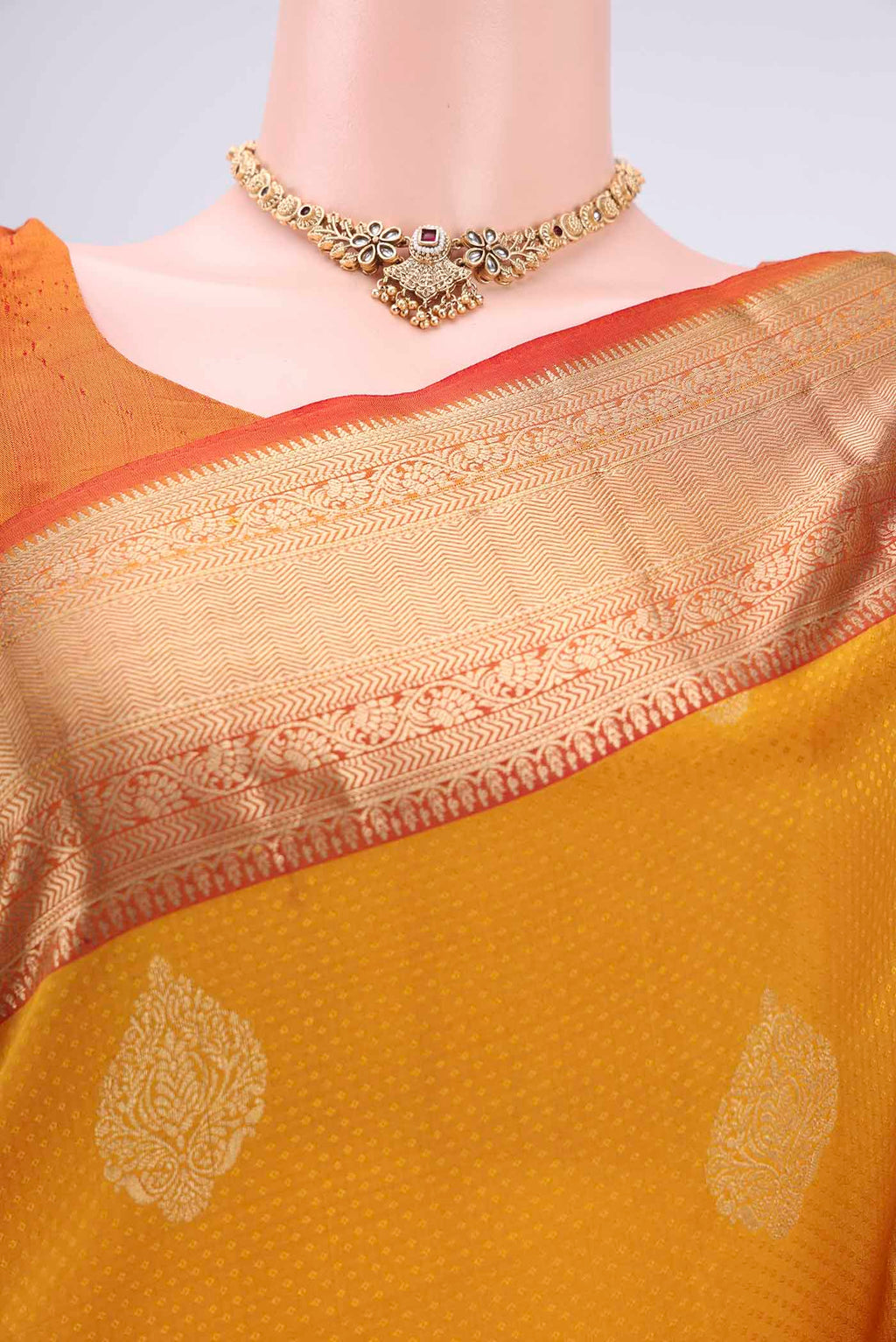 Border image of Yellow Soft Silk Saree with Zari Butta on the body and Zari Border. 