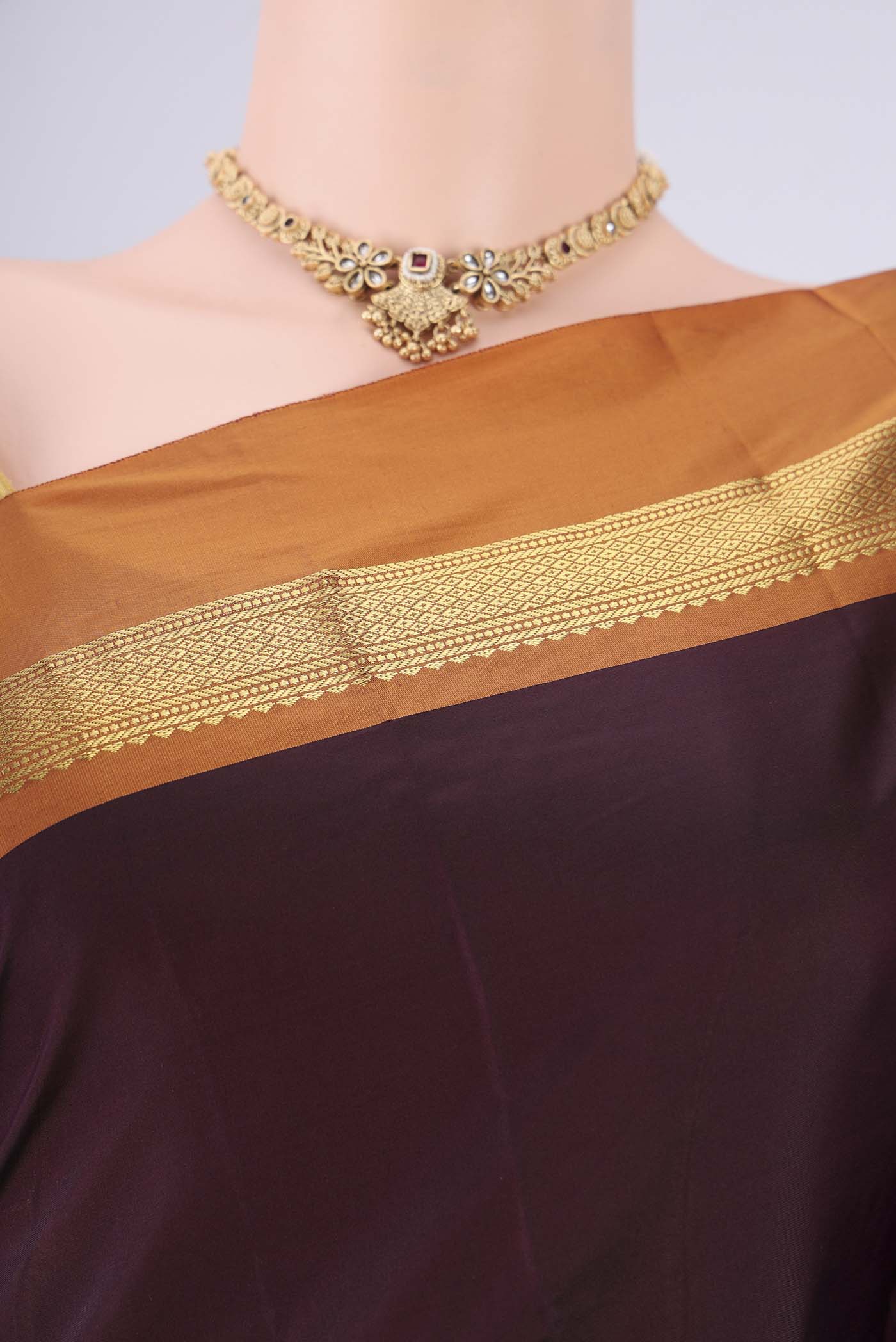Border image of Coffee Brown Blended Bangalore Silk Saree with Plain Body and Zari Border. 