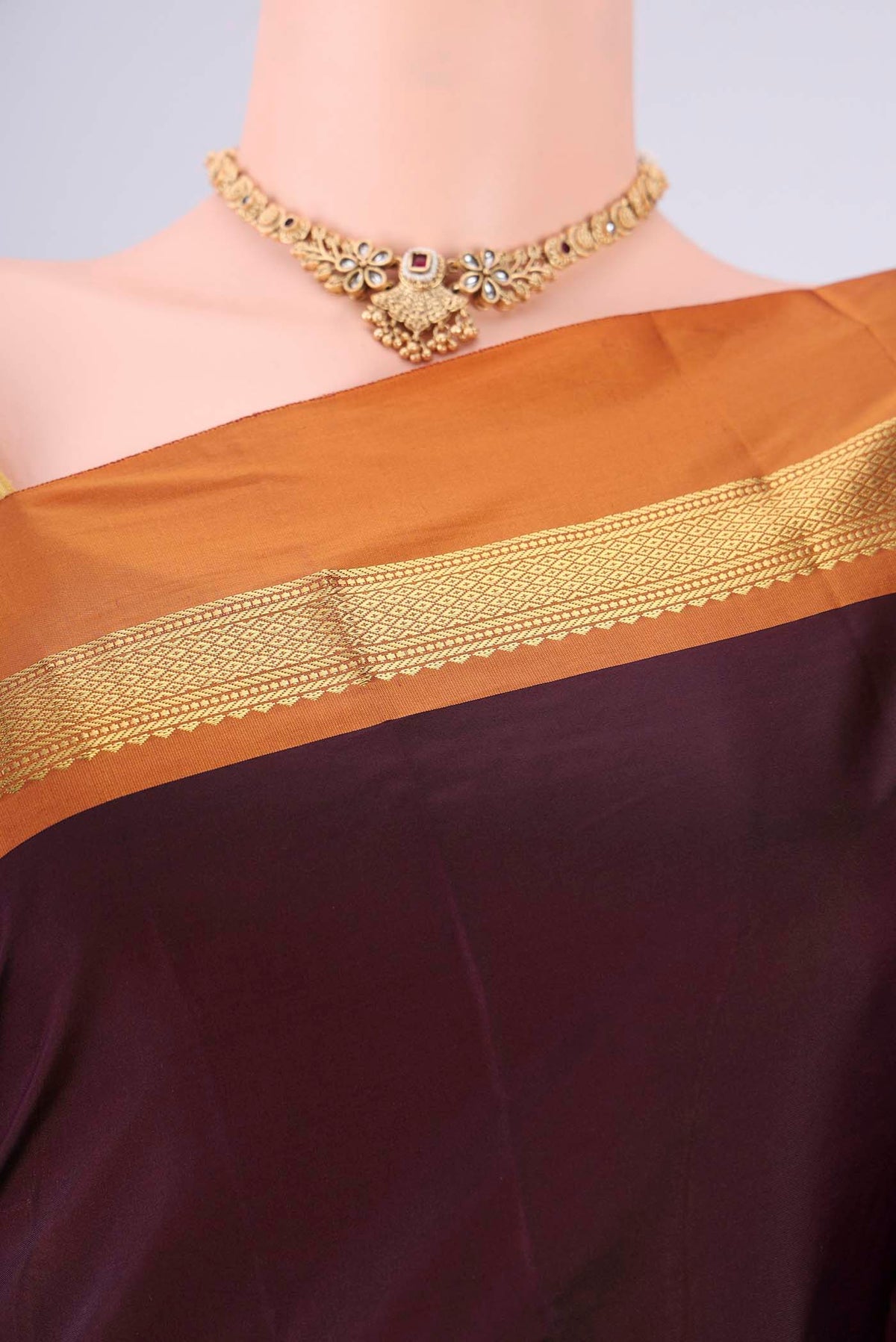 Border image of Coffee Brown Blended Bangalore Silk Saree with Plain Body and Zari Border. 