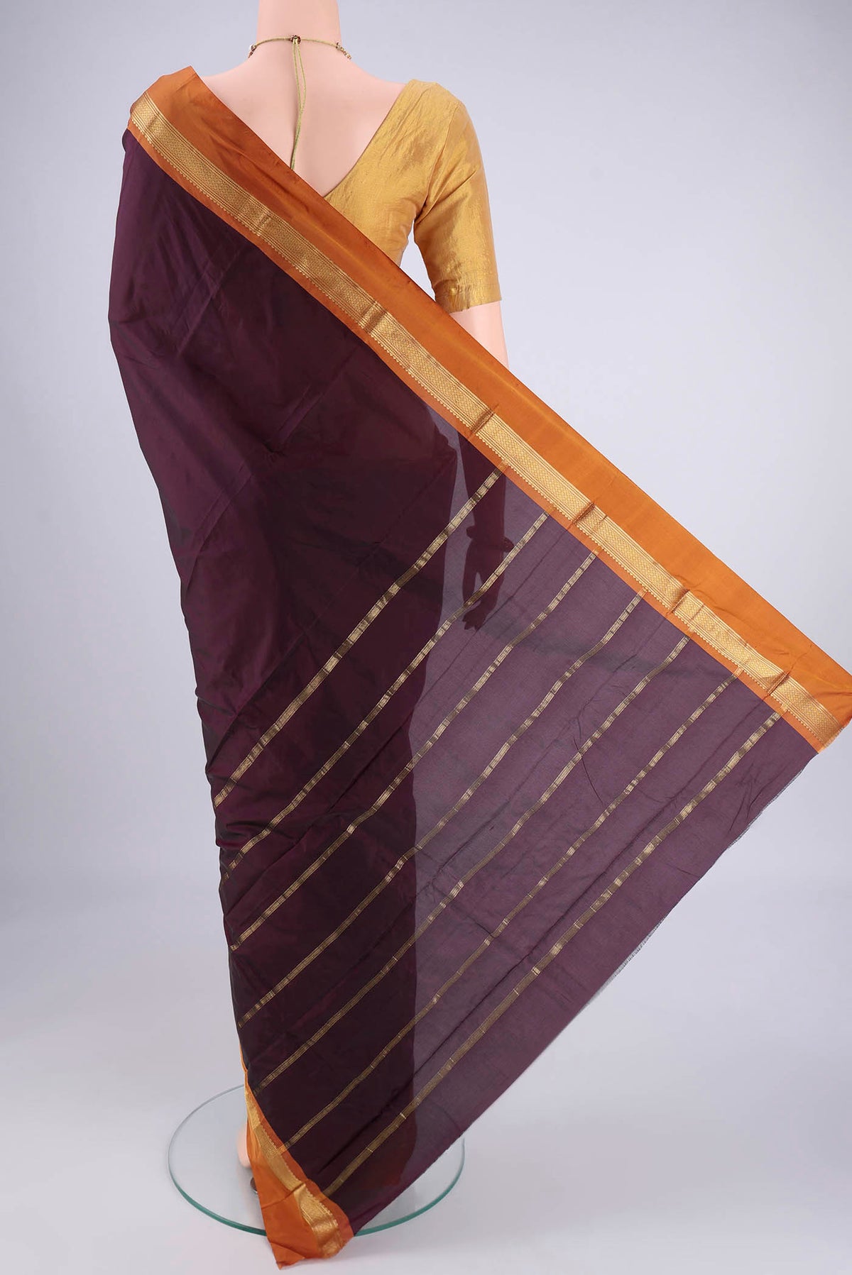 Flat view of Coffee Brown Blended Bangalore Silk Saree with Plain Body and Zari Border. 