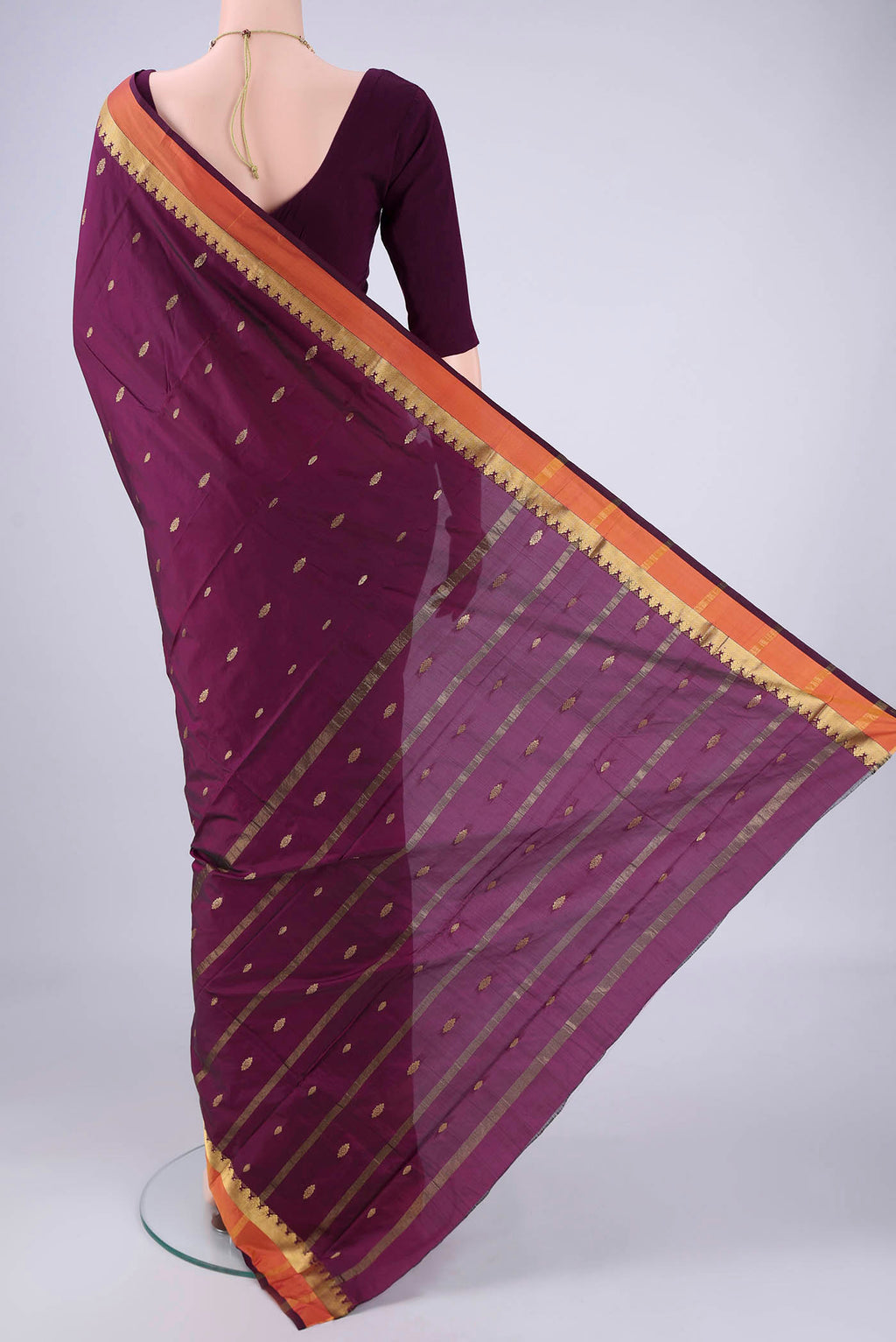 Flat view of Purple Blended Bangalore Silk Saree with Zari Butta on the body and Zari Border. 