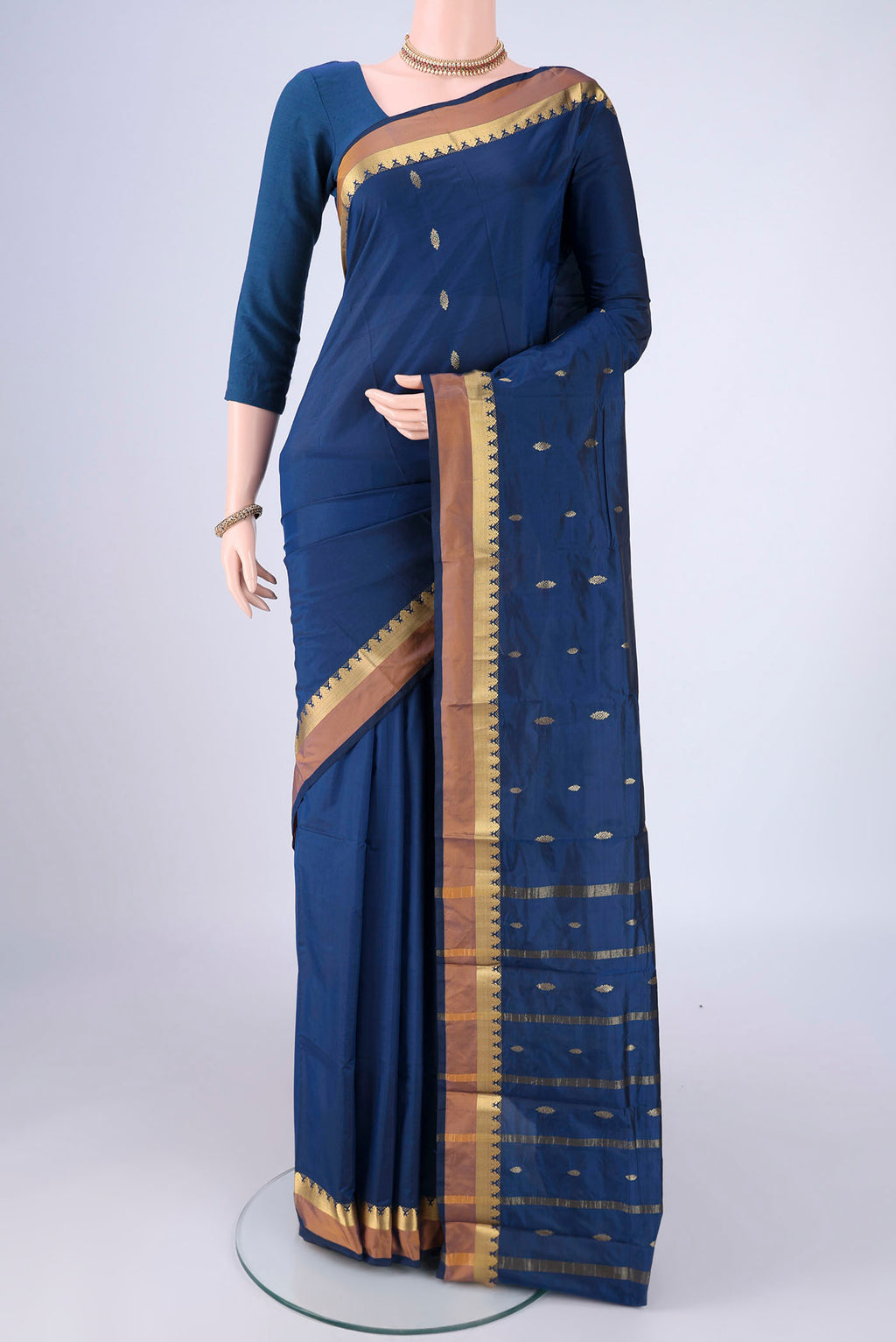 Dark Blue Blended Bangalore Silk Saree with Zari Butta on the body and Zari Border.  displayed on a mannequin