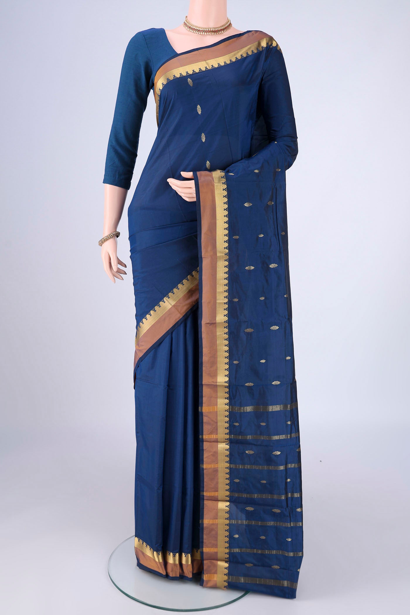Dark Blue Blended Bangalore Silk Saree with Zari Butta on the body and Zari Border.  displayed on a mannequin