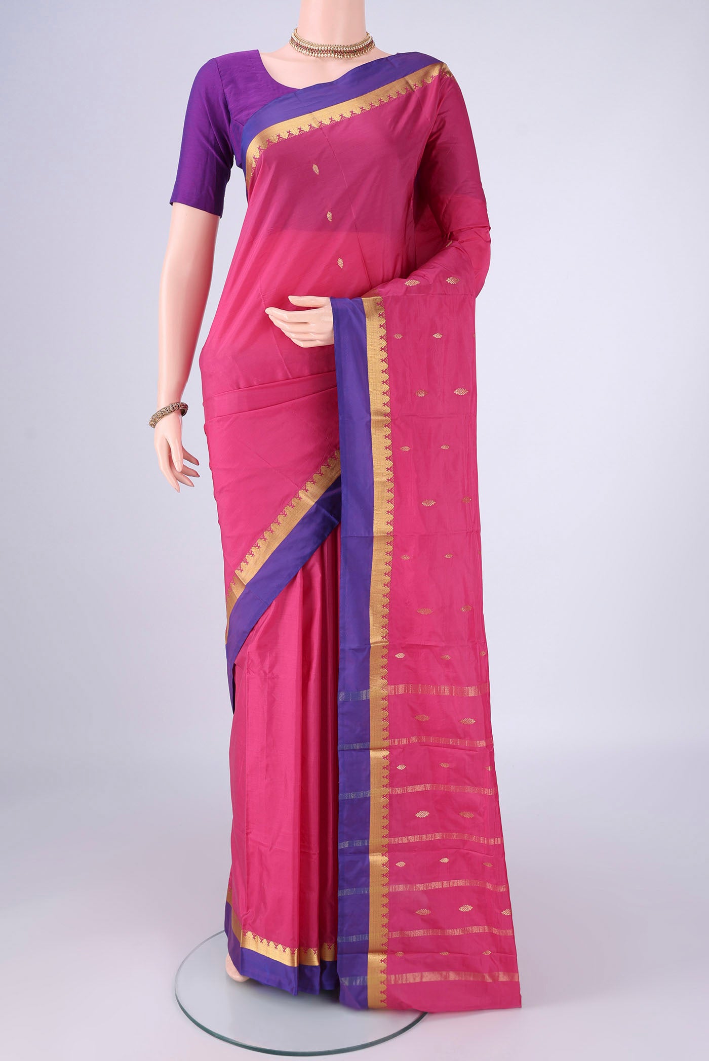 Pink Blended Bangalore Silk Saree with Zari Butta on the body and Zari Border.  displayed on a mannequin