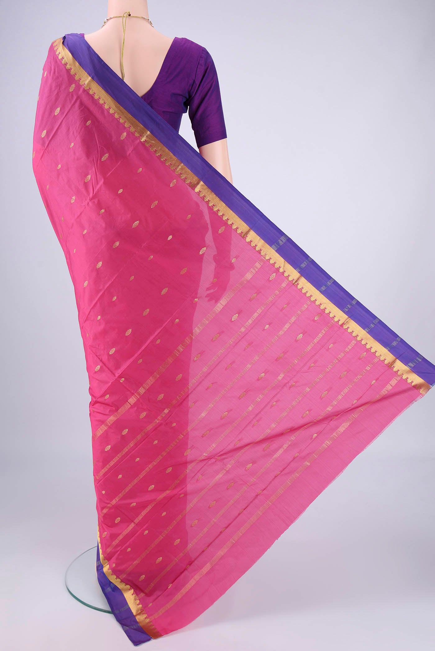 Flat view of Pink Blended Bangalore Silk Saree with Zari Butta on the body and Zari Border. 
