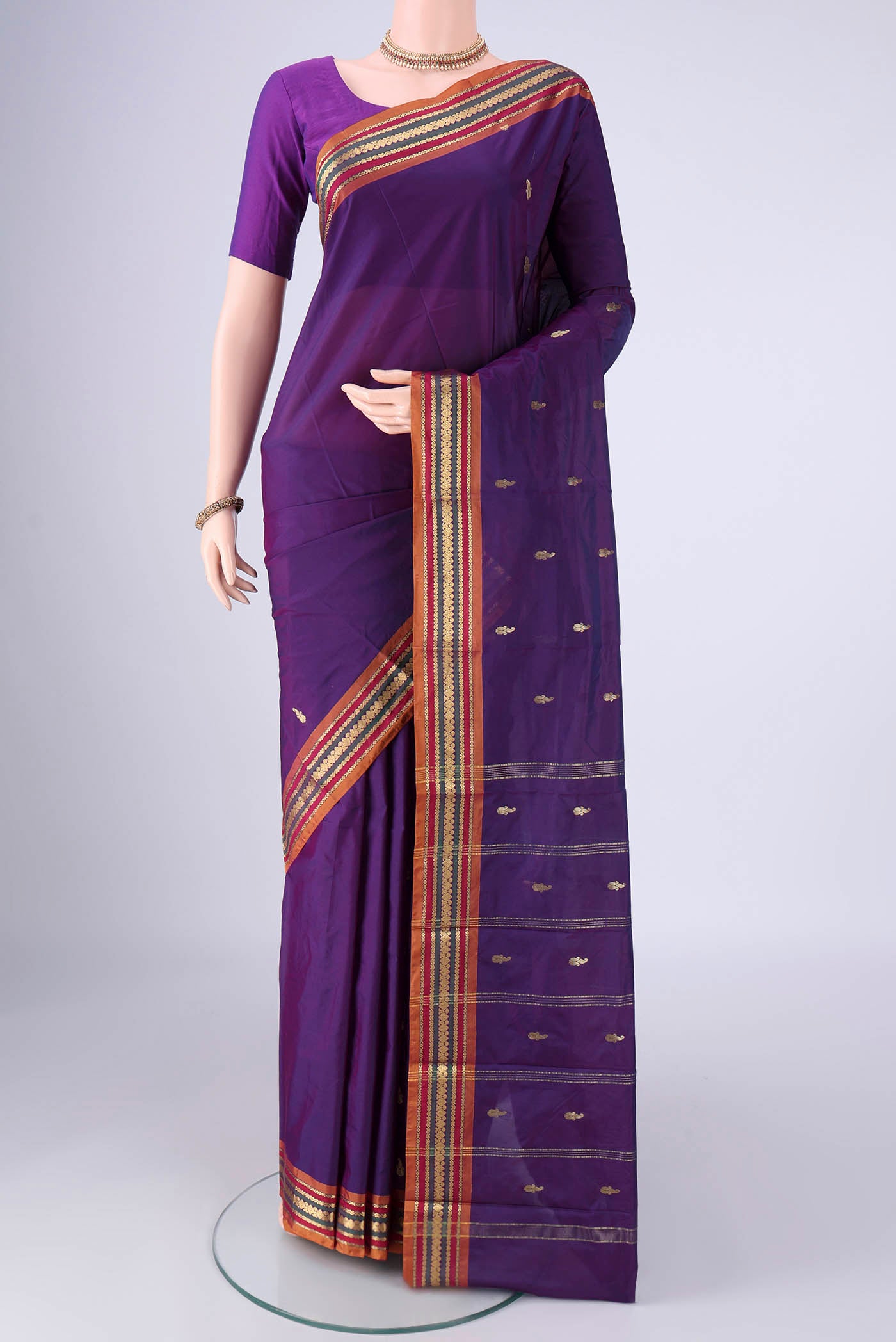 Violet Blended Bangalore Silk Saree with Zari Butta on the body and Zari Border.  displayed on a mannequin