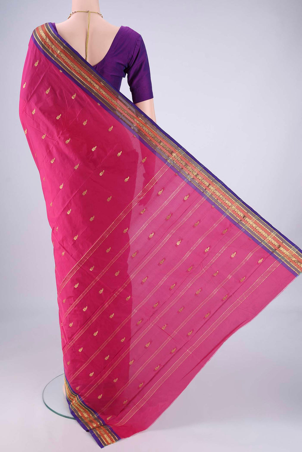 Flat view of Rani Pink Blended Bangalore Silk Saree with Zari Butta on the body and Zari Border. 