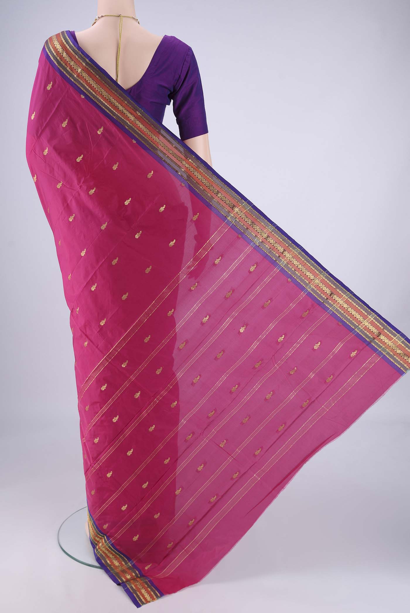Flat view of Rani Pink Blended Bangalore Silk Saree with Zari Butta on the body and Zari Border. 