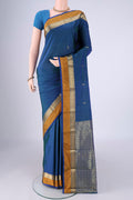 Peacock Blue Dual Tone Blended Bangalore Silk Saree with Zari Butta on the body and Zari Border.  displayed on a mannequin
