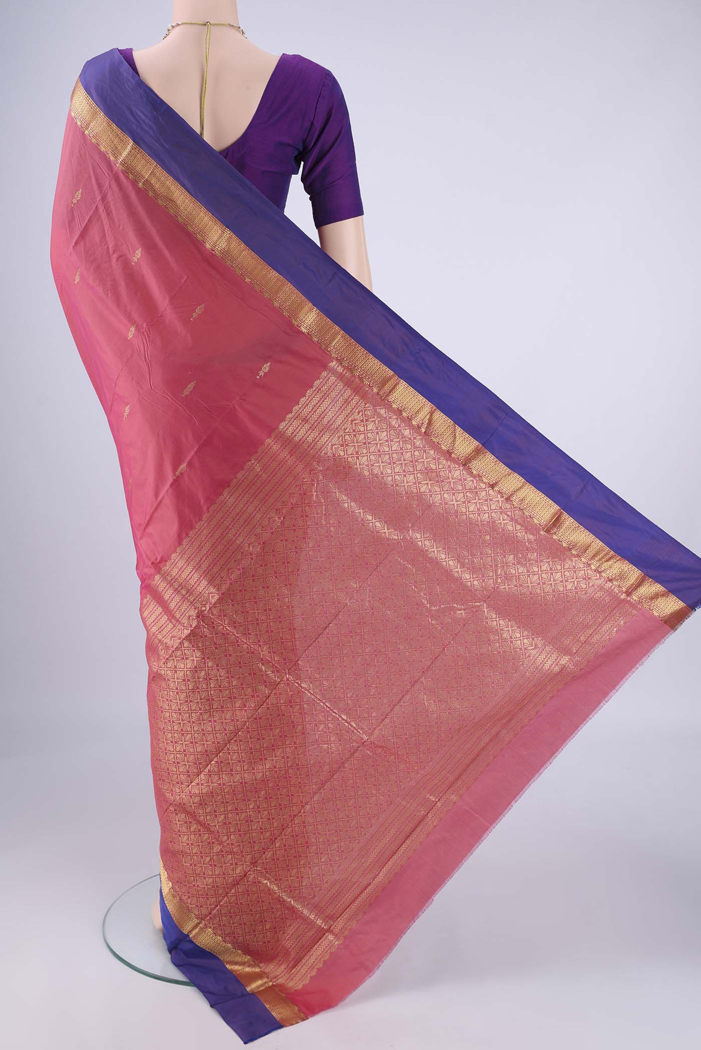 Flat view of Coral Blended Bangalore Silk Saree with Zari Butta on the body and Zari Border. 