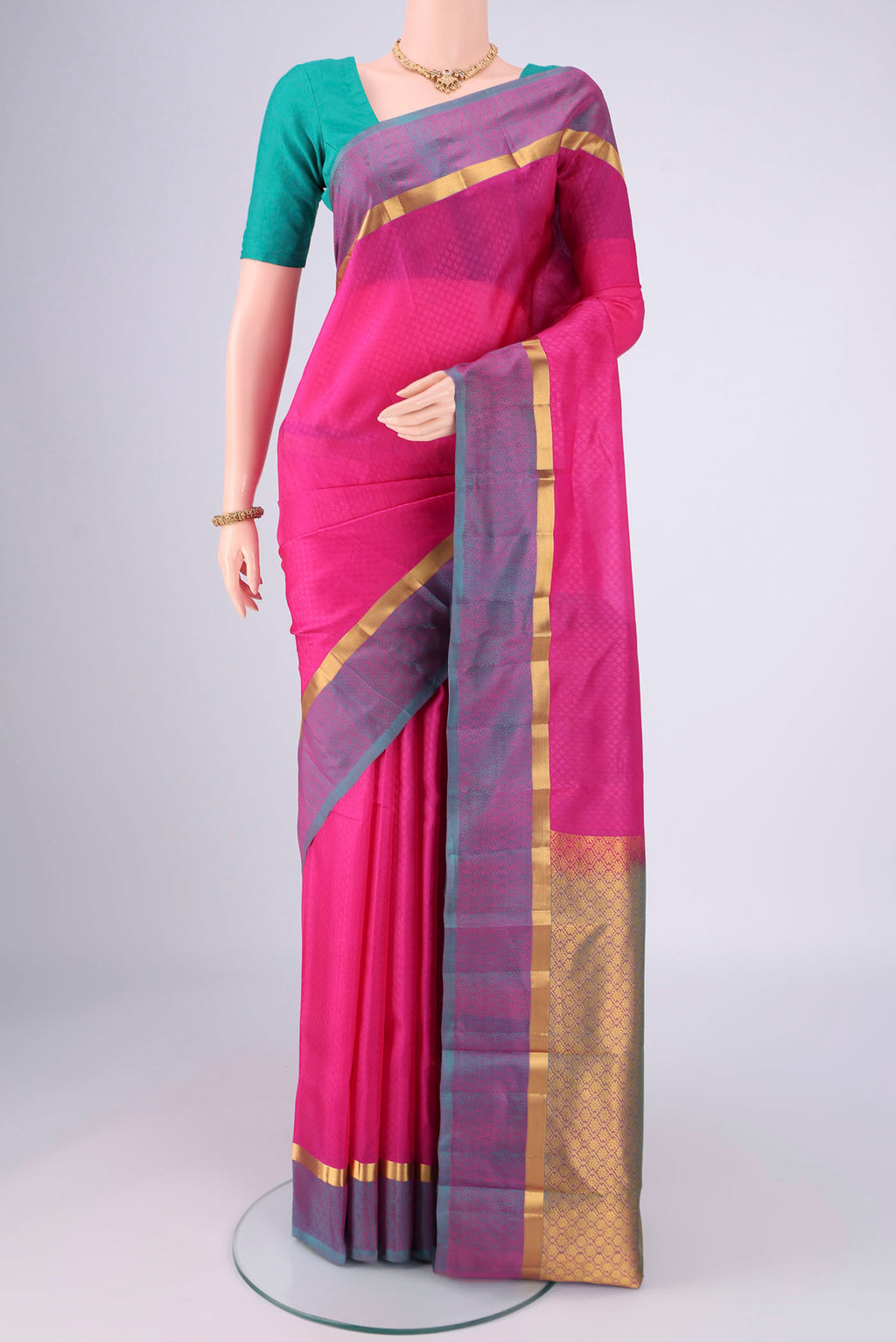 Rani Pink Nangavalli Silk [ Salem ] Saree with Jacquard design on the body and Plain Border.  displayed on a mannequin