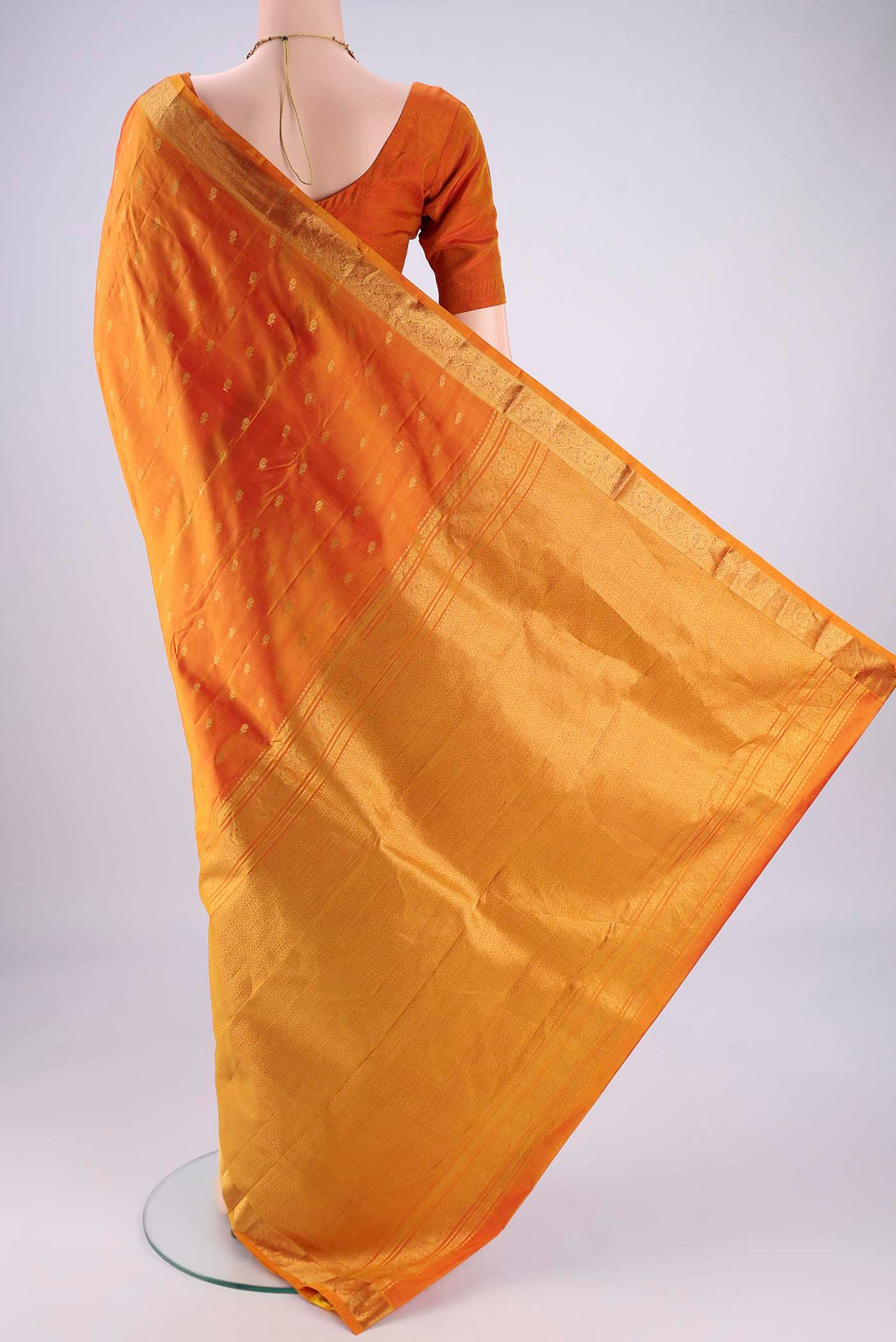Flat view of Yellow Nangavalli Silk [ Salem ] Saree with Zari Butta on the body and Zari Border. 