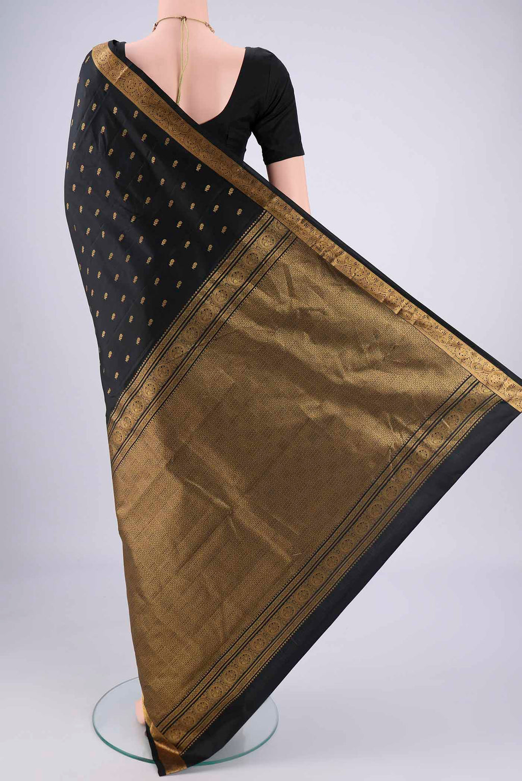 Flat view of Black Nangavalli Silk [ Salem ] Saree with Zari Butta on the body and Zari Border. 
