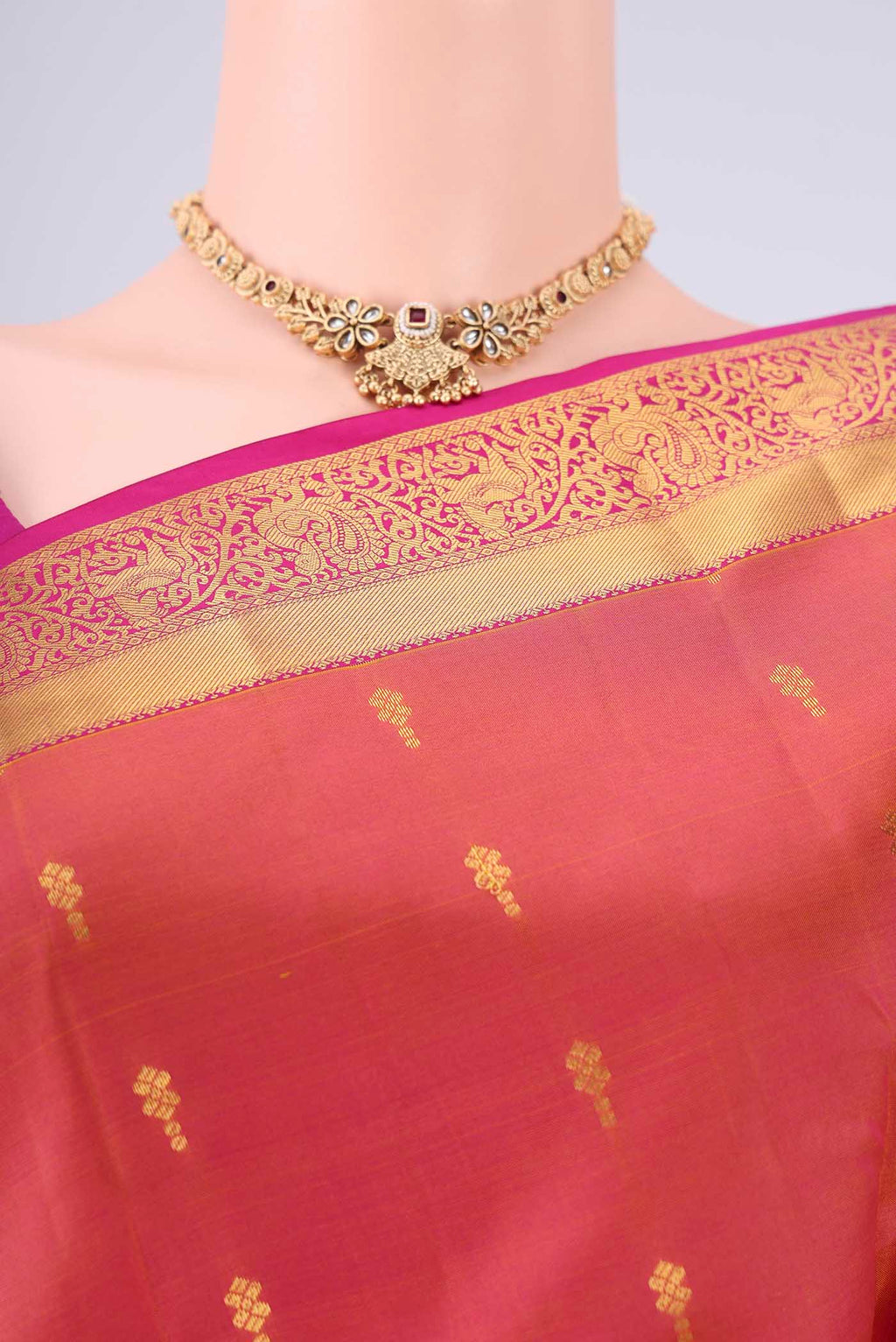 Border image of Pinkish Yellow Nangavalli Silk [ Salem ] Saree with Zari Butta on the body and Zari Border. 
