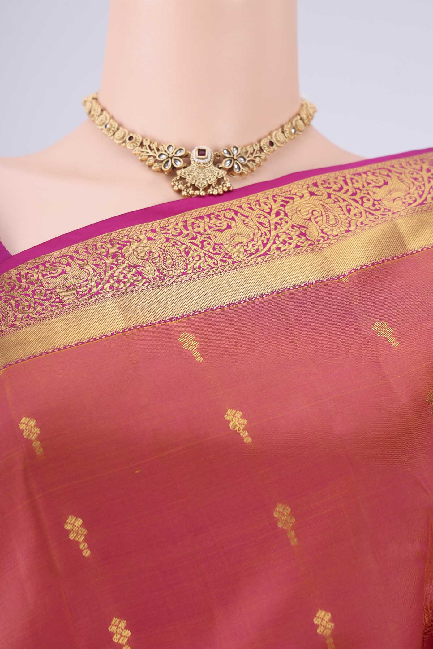 Border image of Pinkish Yellow Nangavalli Silk [ Salem ] Saree with Zari Butta on the body and Zari Border. 