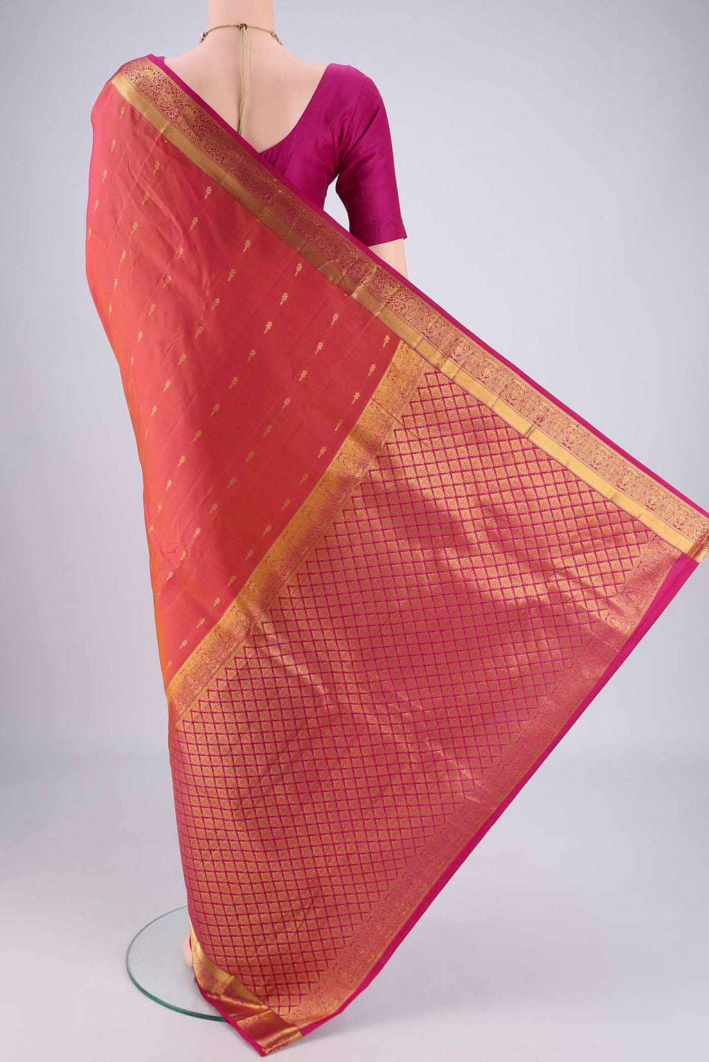 Flat view of Pinkish Yellow Nangavalli Silk [ Salem ] Saree with Zari Butta on the body and Zari Border. 