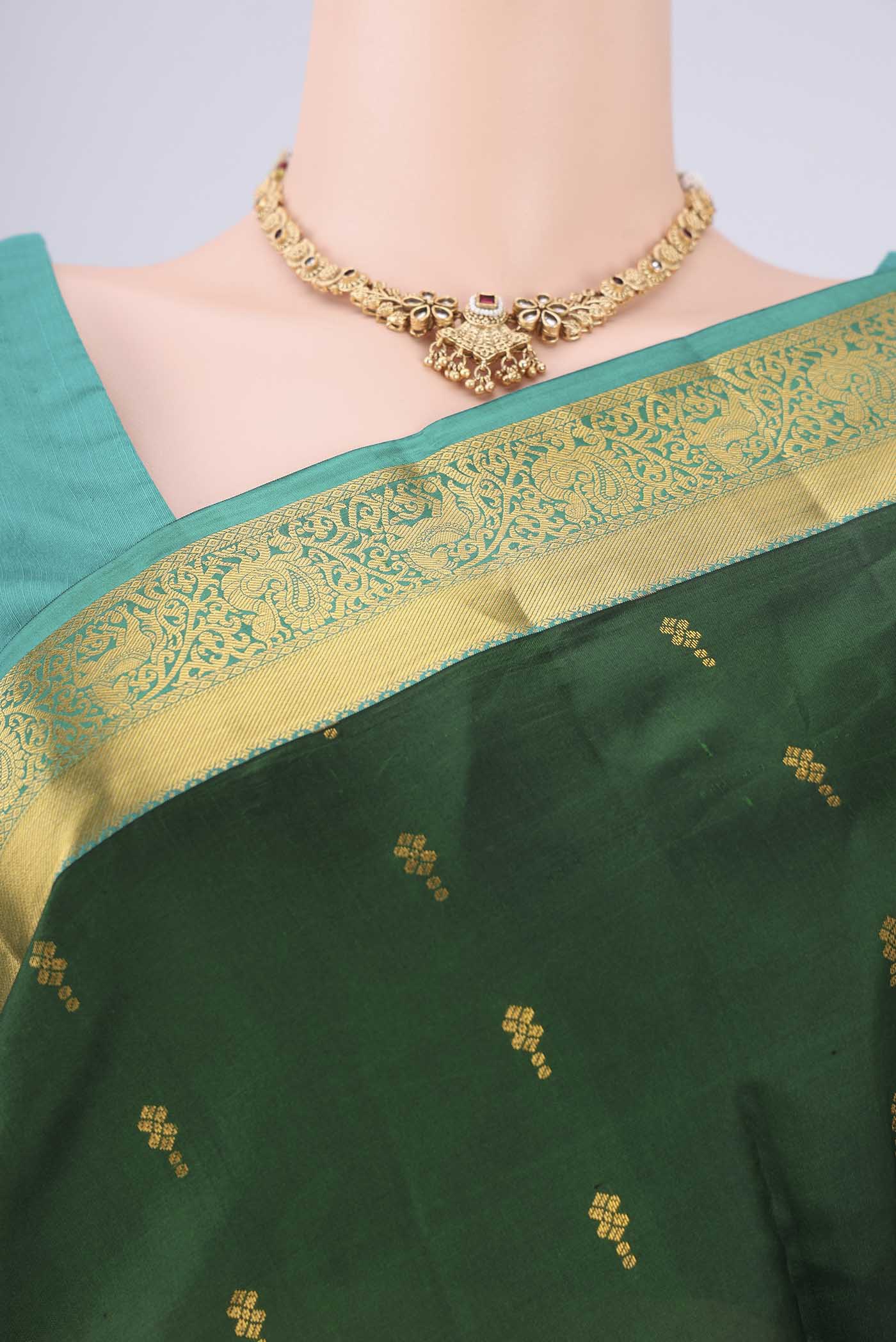 Border image of Bottle Green Nangavalli Silk [ Salem ] Saree with Zari Butta on the body and Zari Border. 