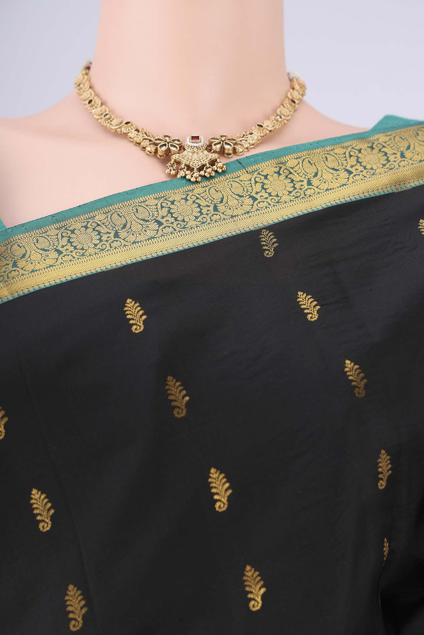 Border image of Black Nangavalli Silk [ Salem ] Saree with Zari Butta on the body and Zari Border. 
