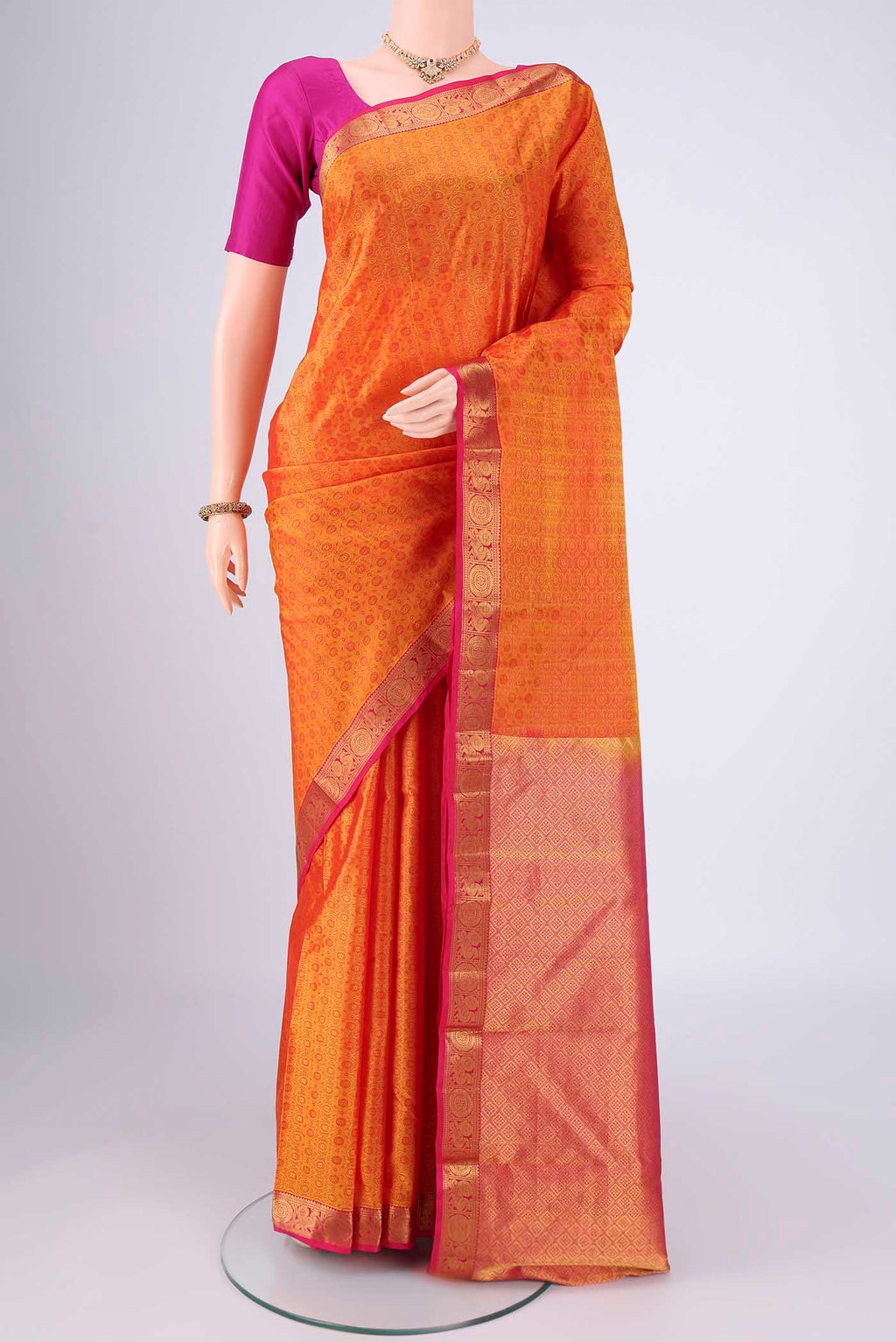 Yellow Nangavalli Silk [ Salem ] Saree with Jacquard design on the body and Zari Border.  displayed on a mannequin