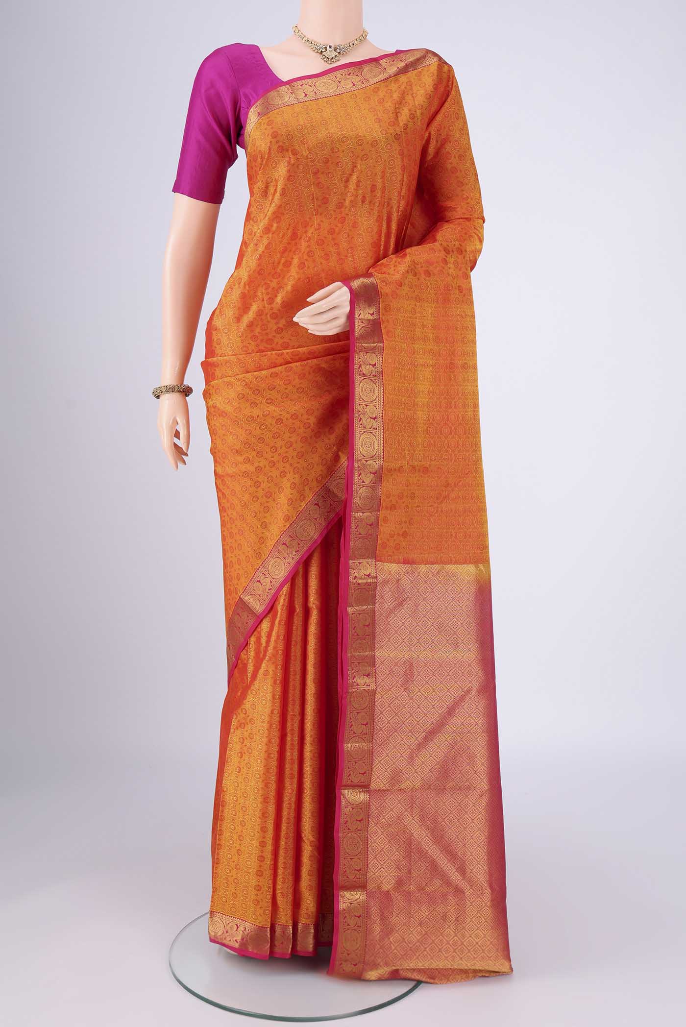 Yellow Nangavalli Silk [ Salem ] Saree with Jacquard design on the body and Zari Border.  displayed on a mannequin