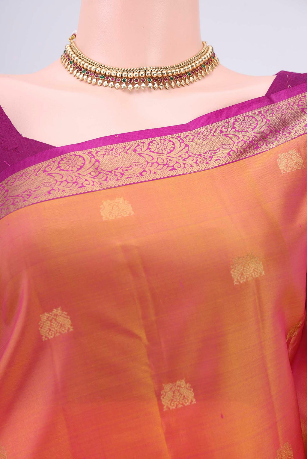 Border image of Brick Orange Kanjivaram Silk Saree with Zari Butta on the body and Zari Border. 