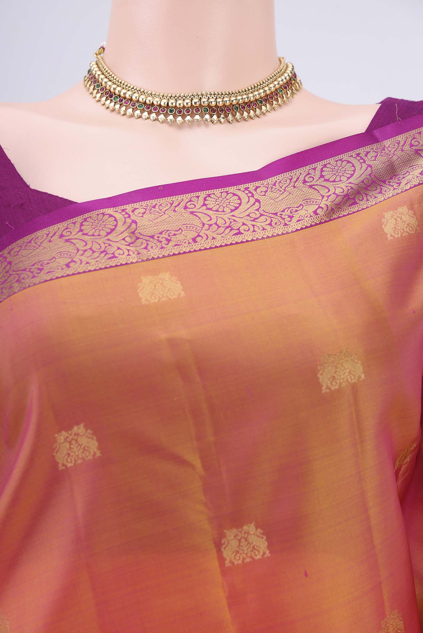 Border image of Brick Orange Kanjivaram Silk Saree with Zari Butta on the body and Zari Border. 