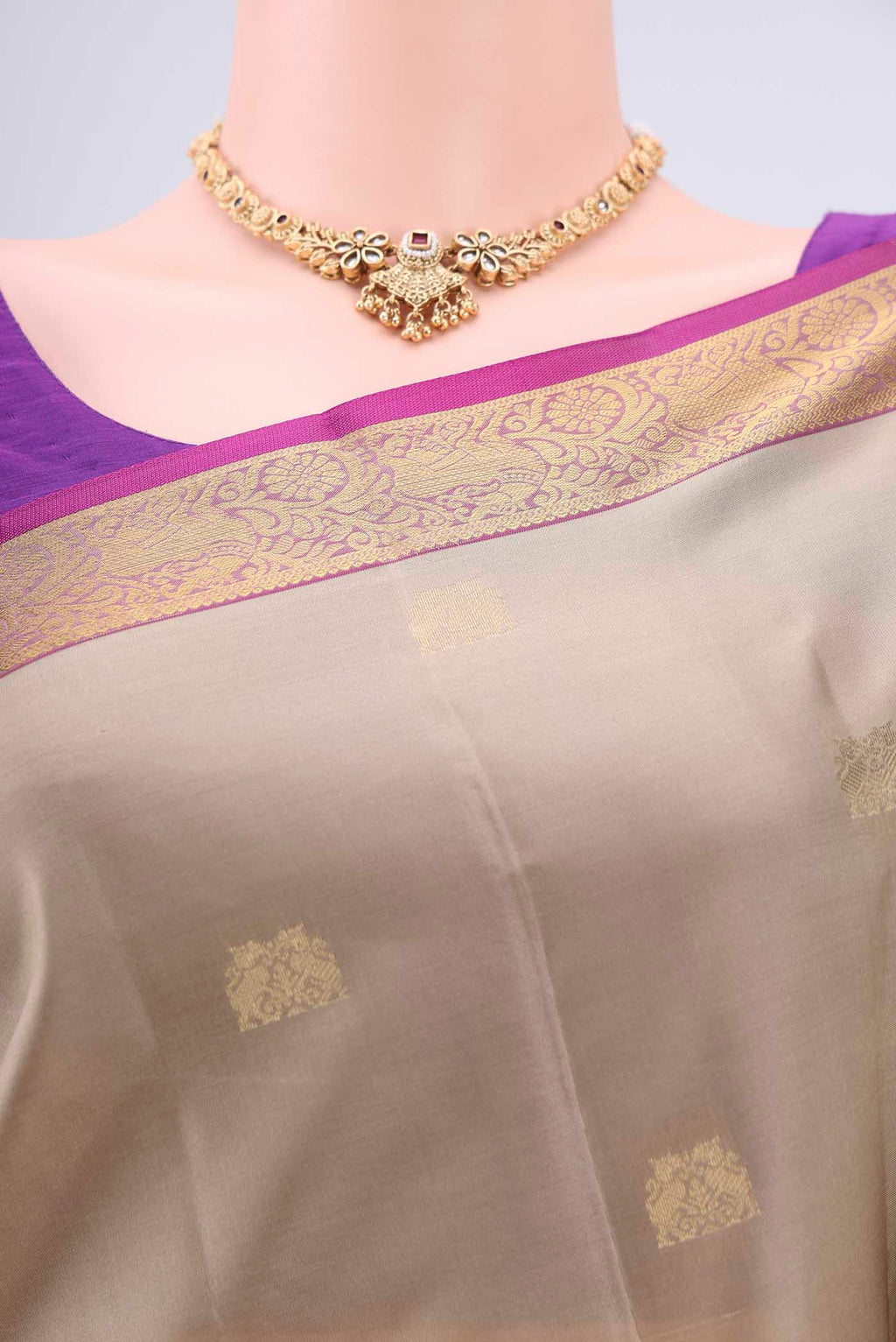 Border image of Beige Dual Tone Kanjivaram Silk Saree with Zari Butta on the body and Zari Border. 