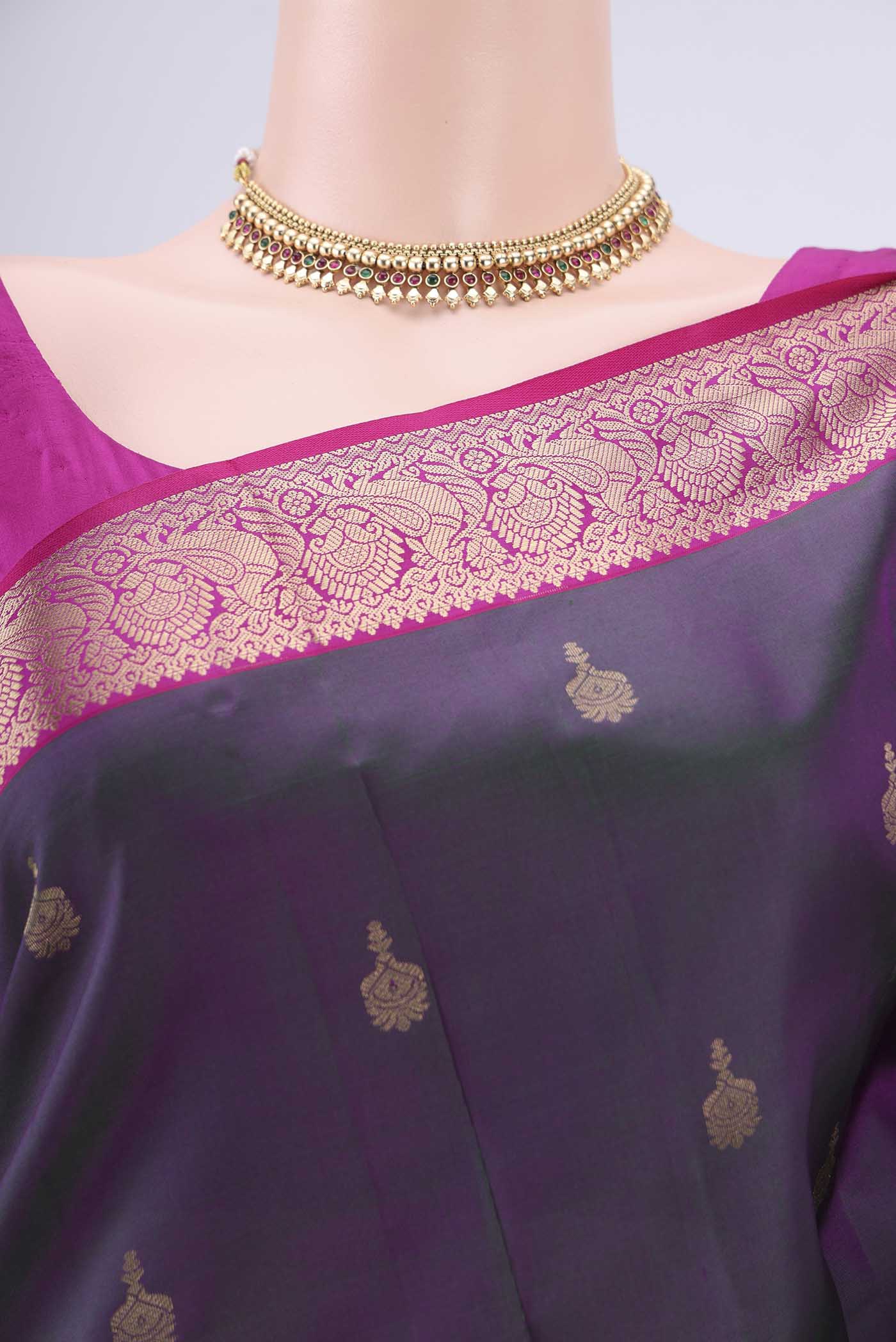 Border image of Green Dual Tone Kanjivaram Silk Saree with Zari Butta on the body and Zari Border. 