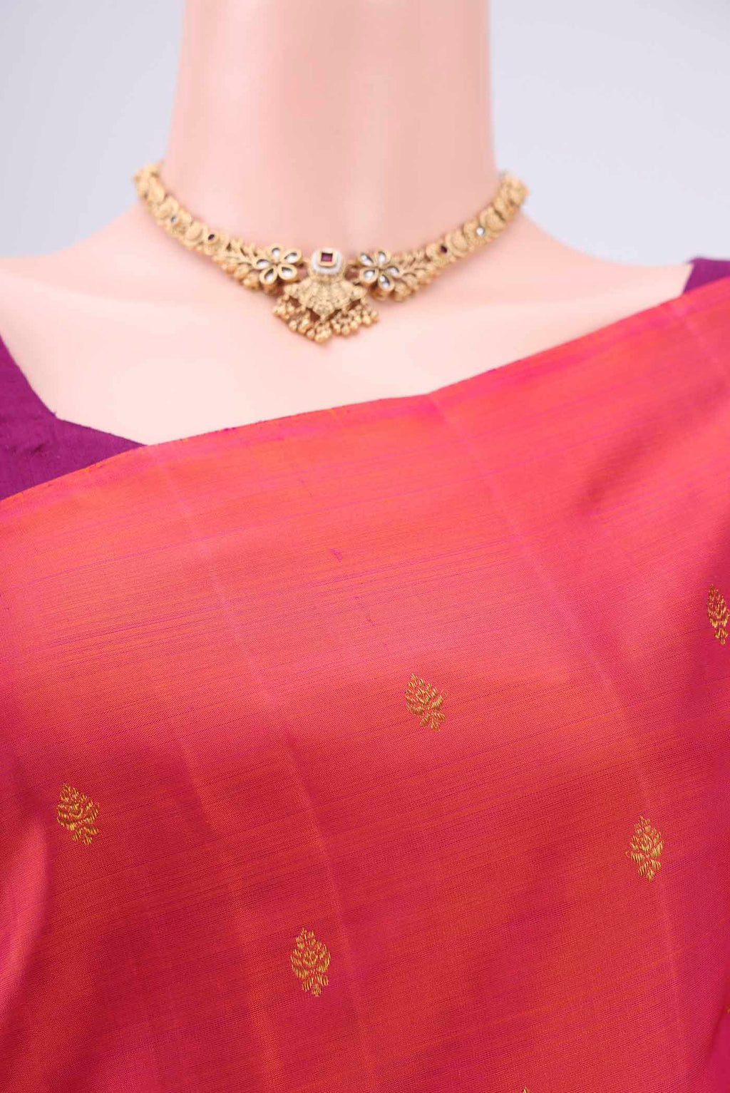 Border image of Orange Dual Tone Kanchipuram Silk Saree with Zari Butta on the body and Attached Border. 