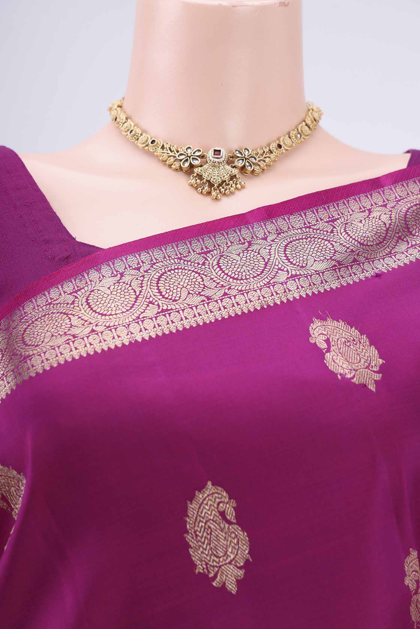 Border image of Magenta Kanjivaram Silk Saree with Zari Butta on the body and Zari Border. 