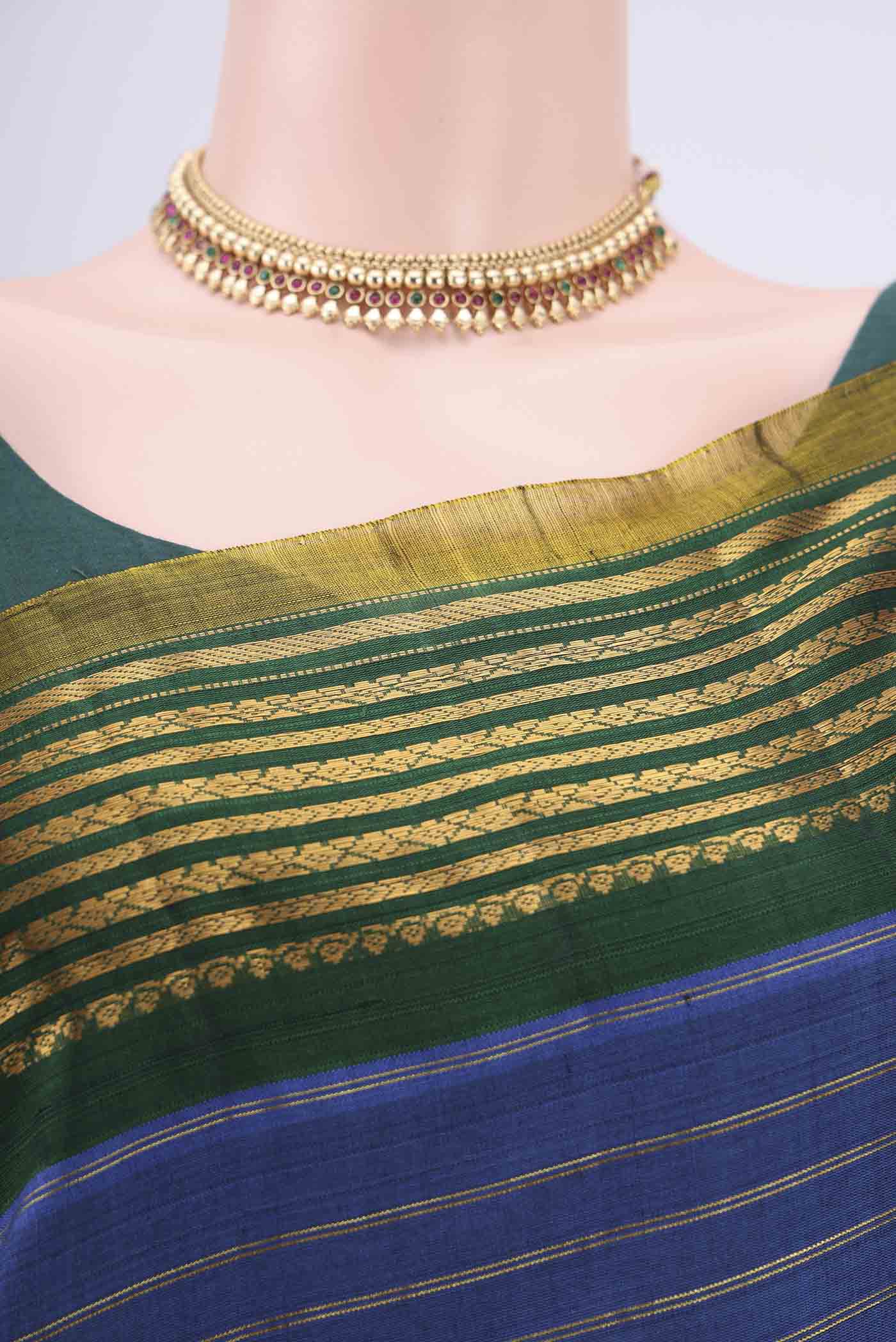 Border image of Blue Gadwal Silk Saree with Stripes on the body and Zari Border. 