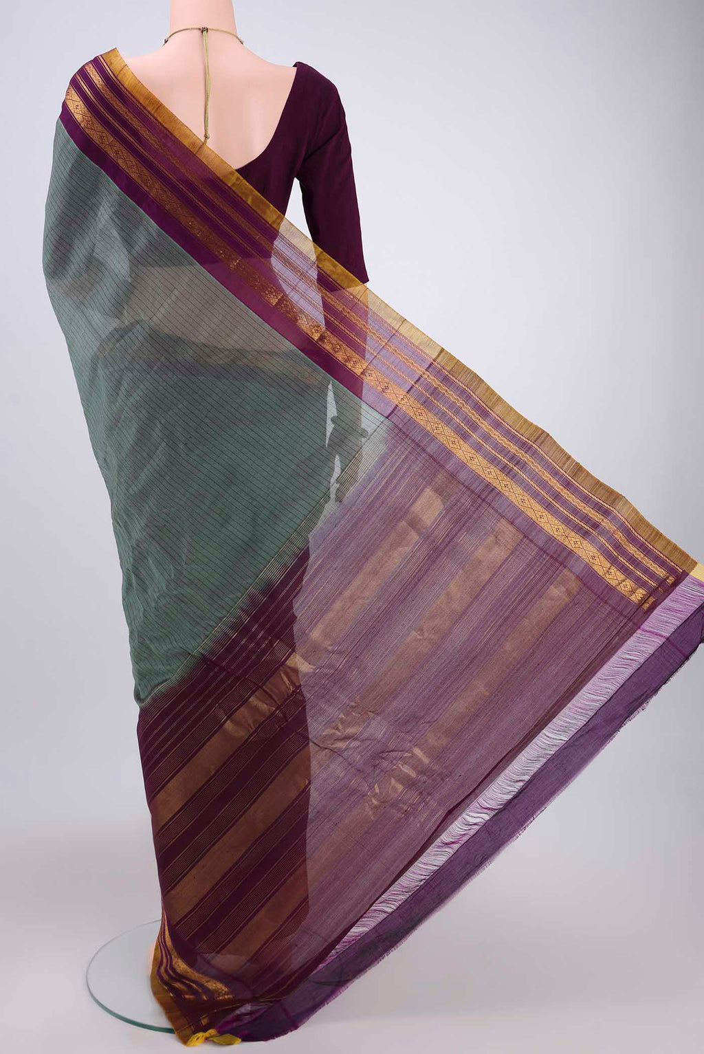 Flat view of Davys Grey Gadwal Silk Saree with Stripes on the body and Zari Border. 