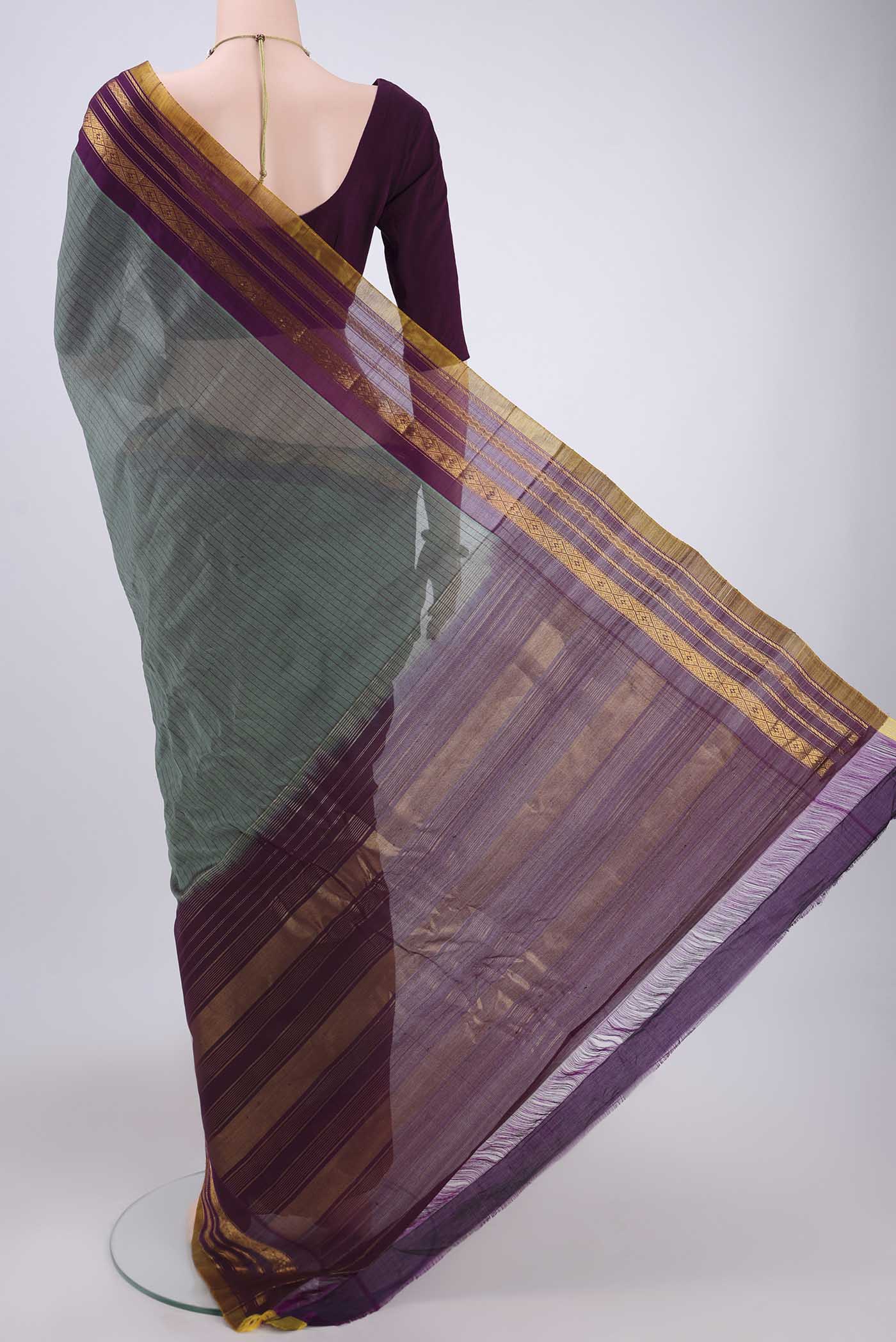 Flat view of Davys Grey Gadwal Silk Saree with Stripes on the body and Zari Border. 